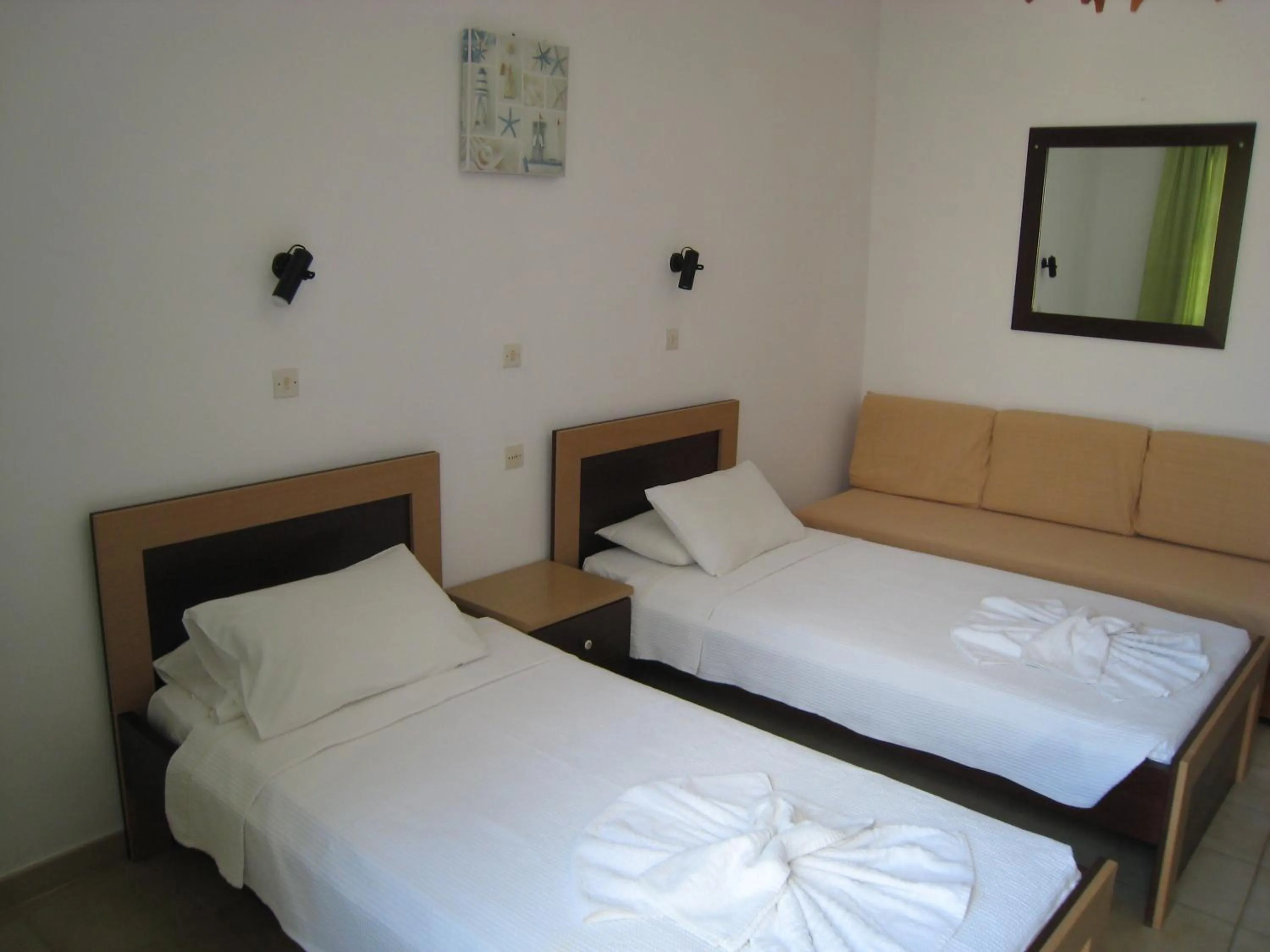 Photo of the whole room, Bed in Eleftheria Lindian Studios II