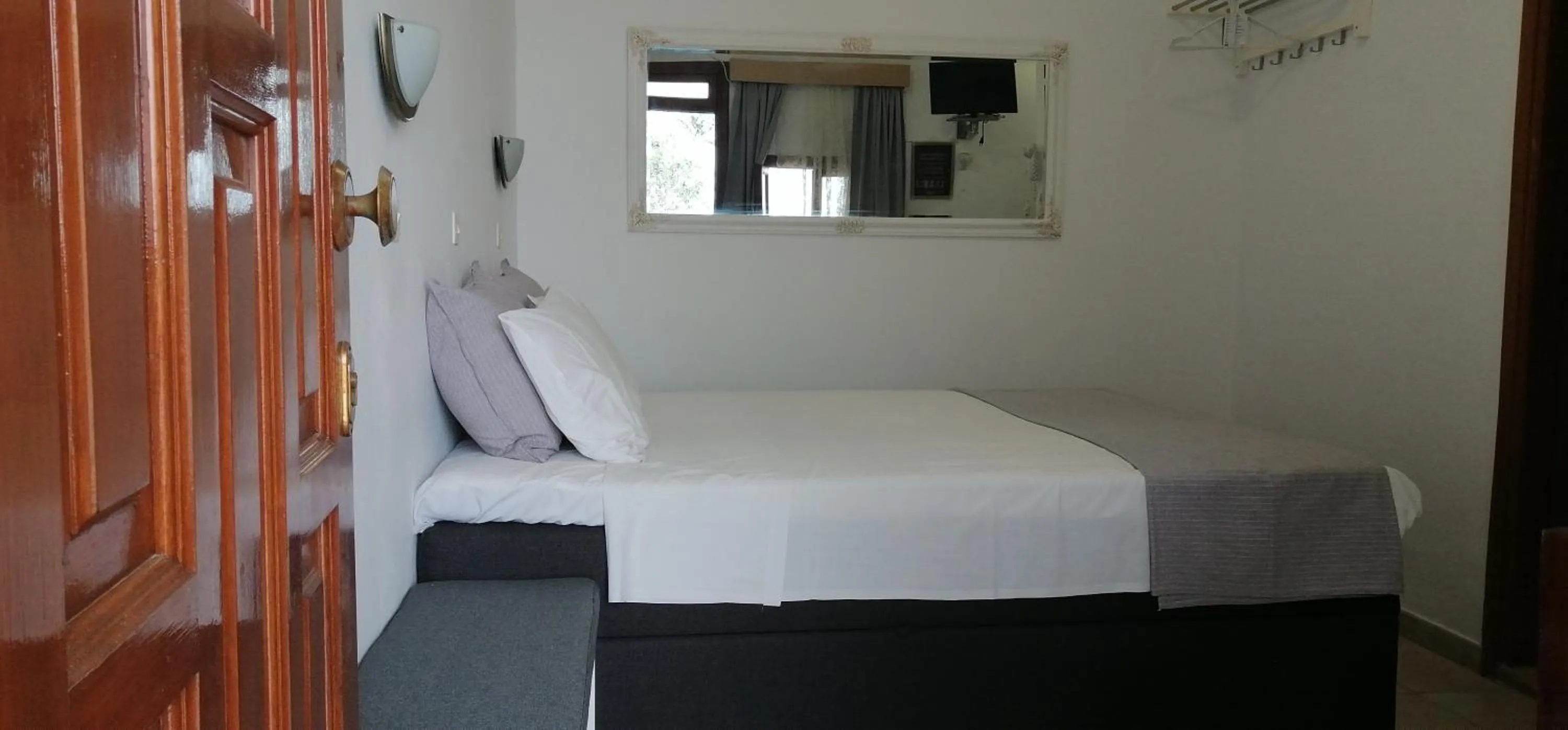 Bed in Eleftheria Lindian Studios II