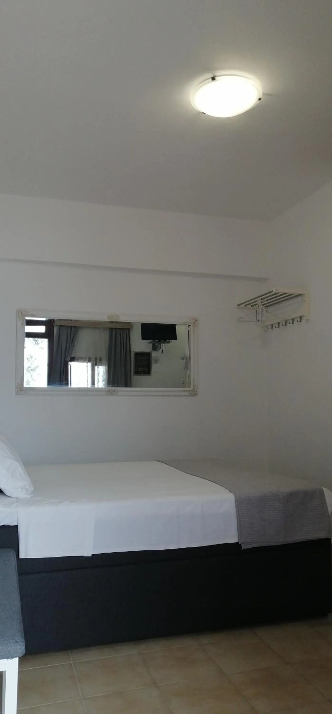 Bed in Eleftheria Lindian Studios II