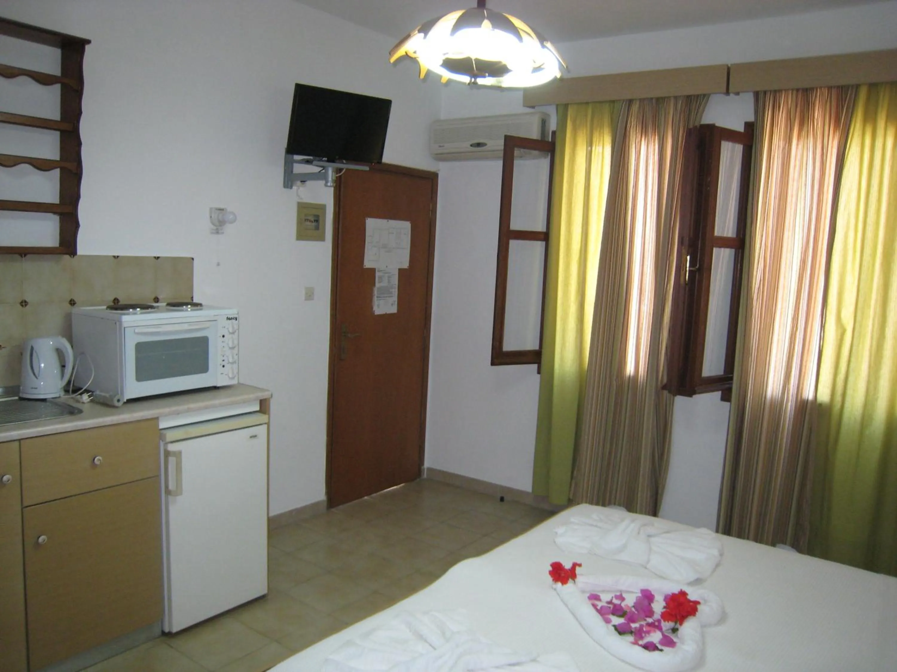 Bed in Eleftheria Lindian Studios II