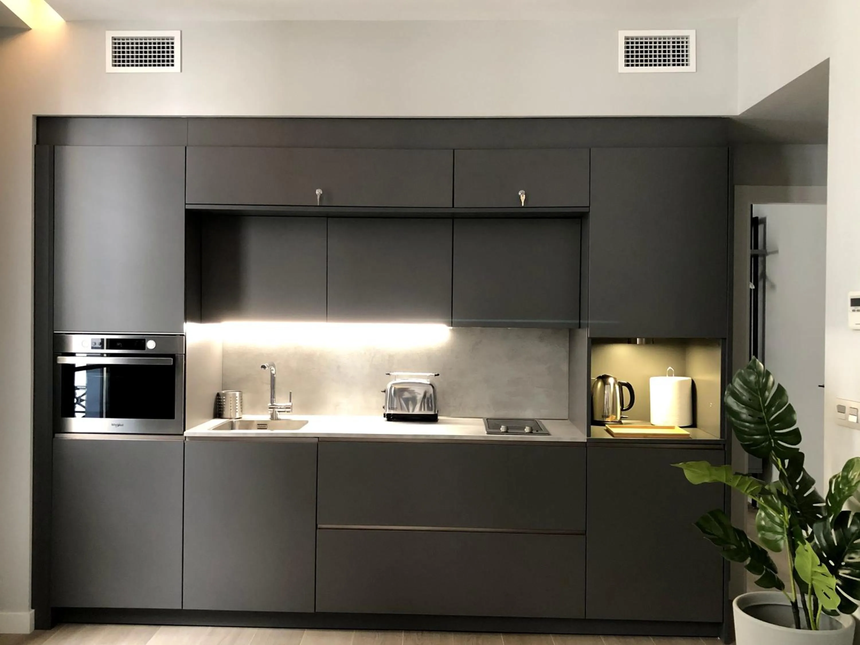 Kitchen or kitchenette in Arenal Suites Alicante