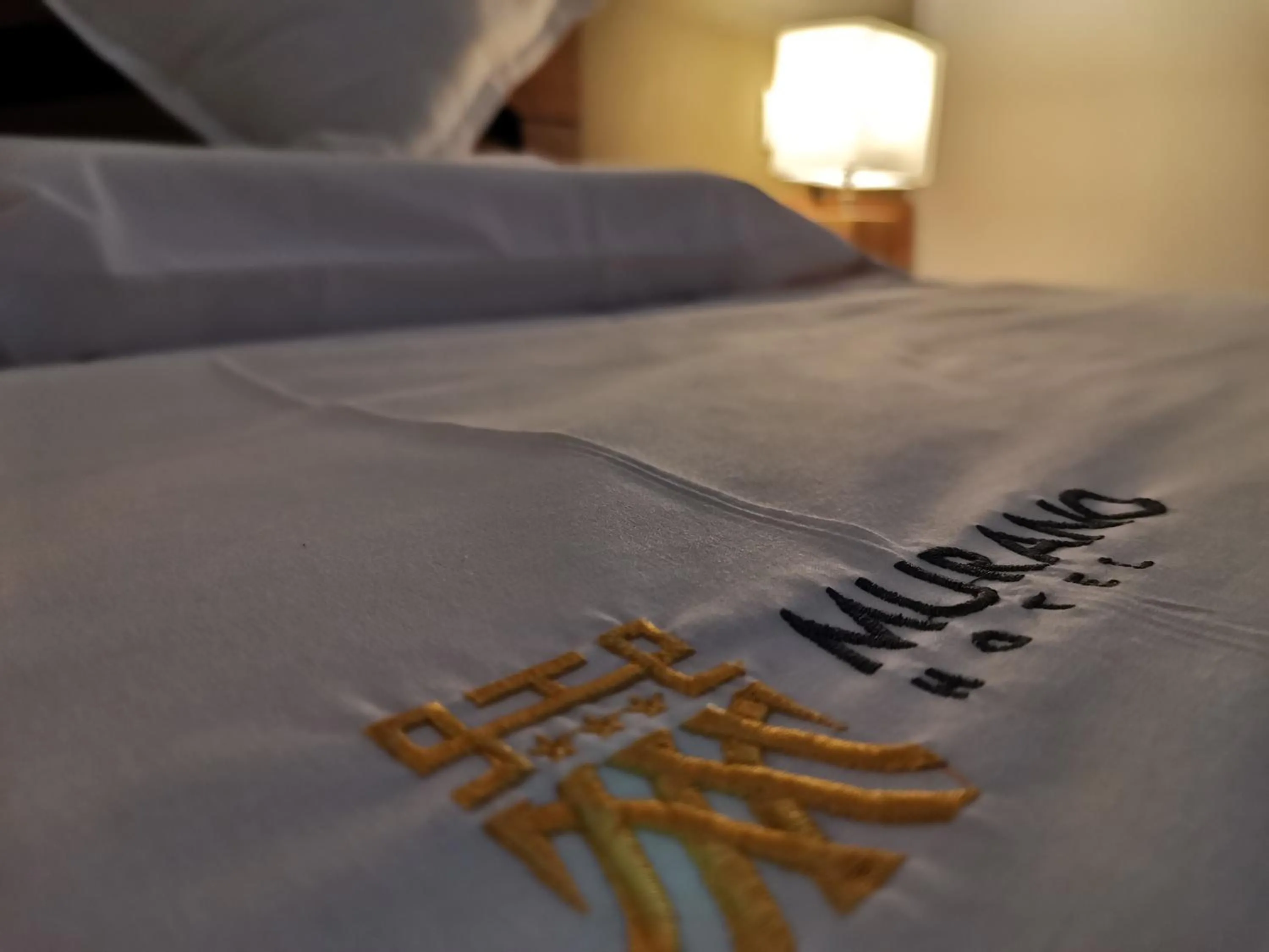 Bed in Murano Hotel