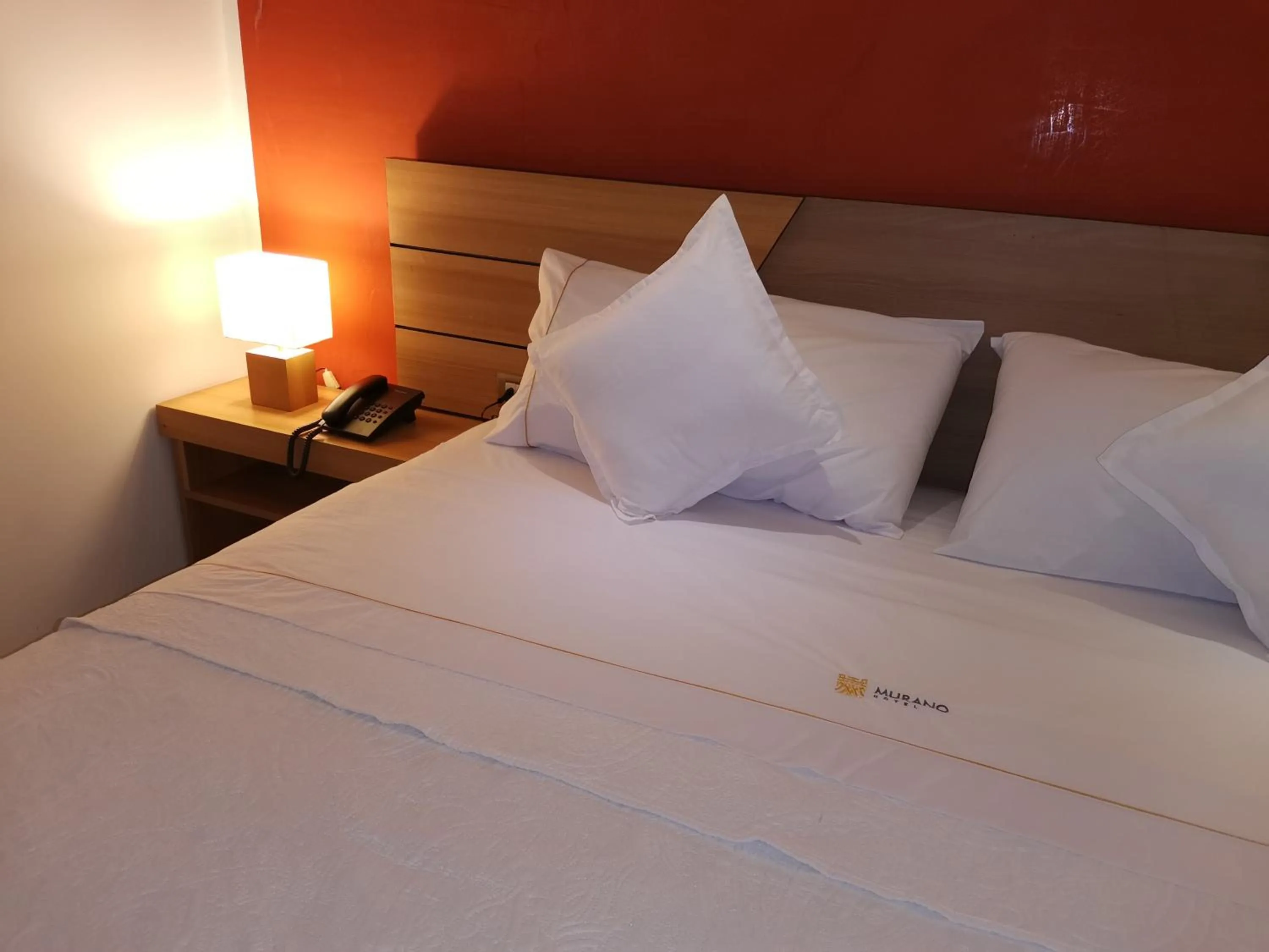 Bed in Murano Hotel