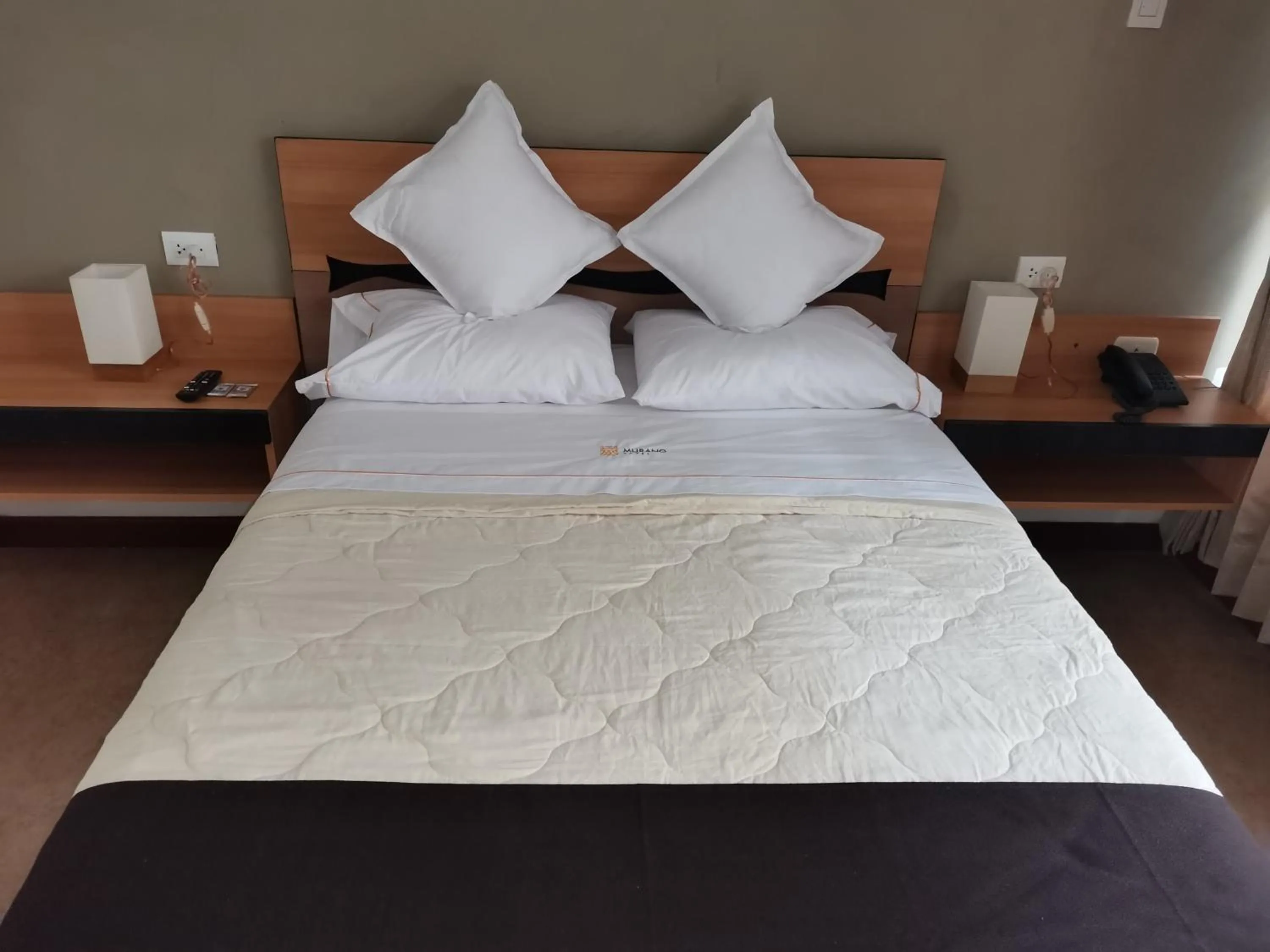 Bed in Murano Hotel