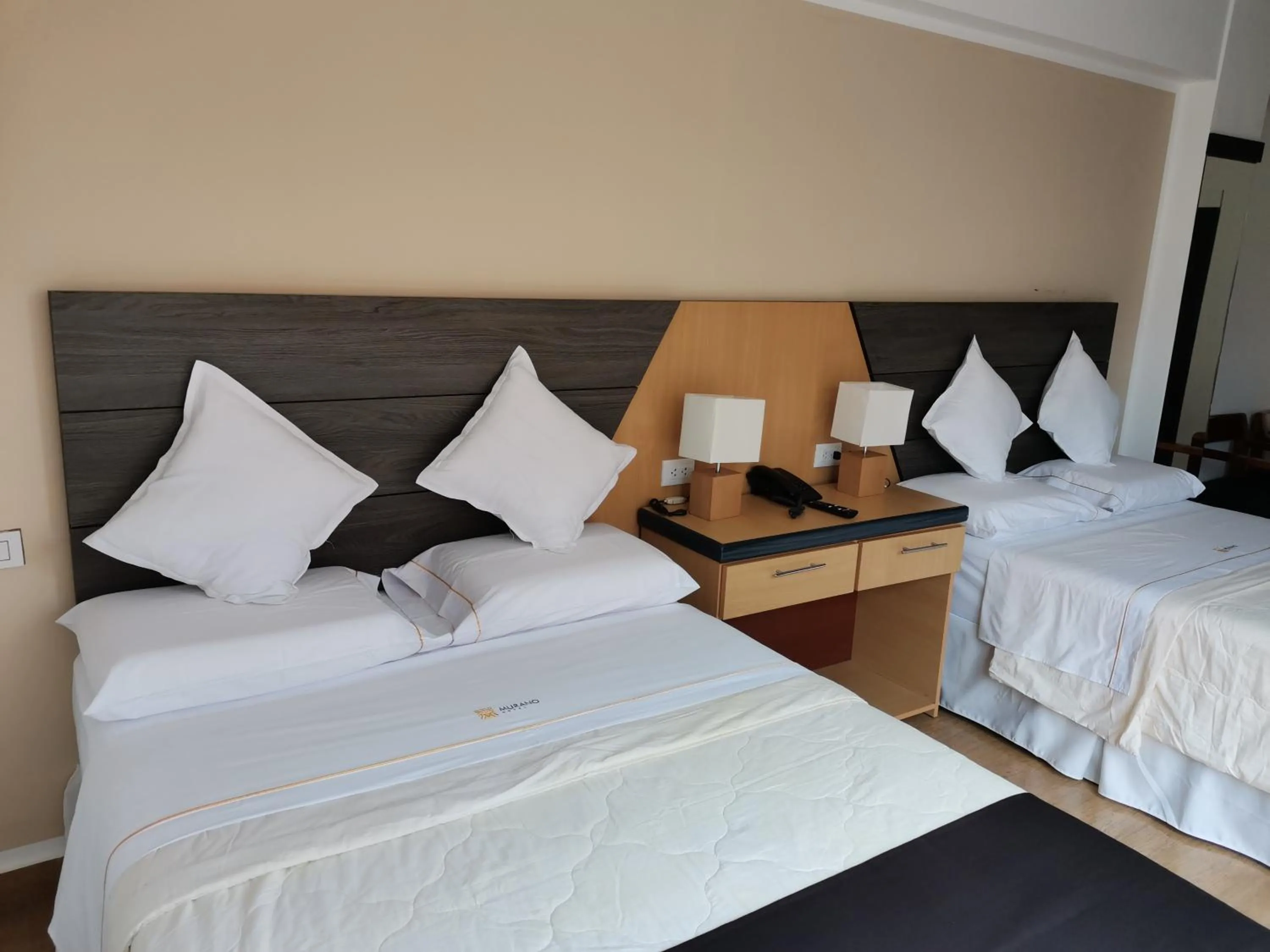 Bed in Murano Hotel