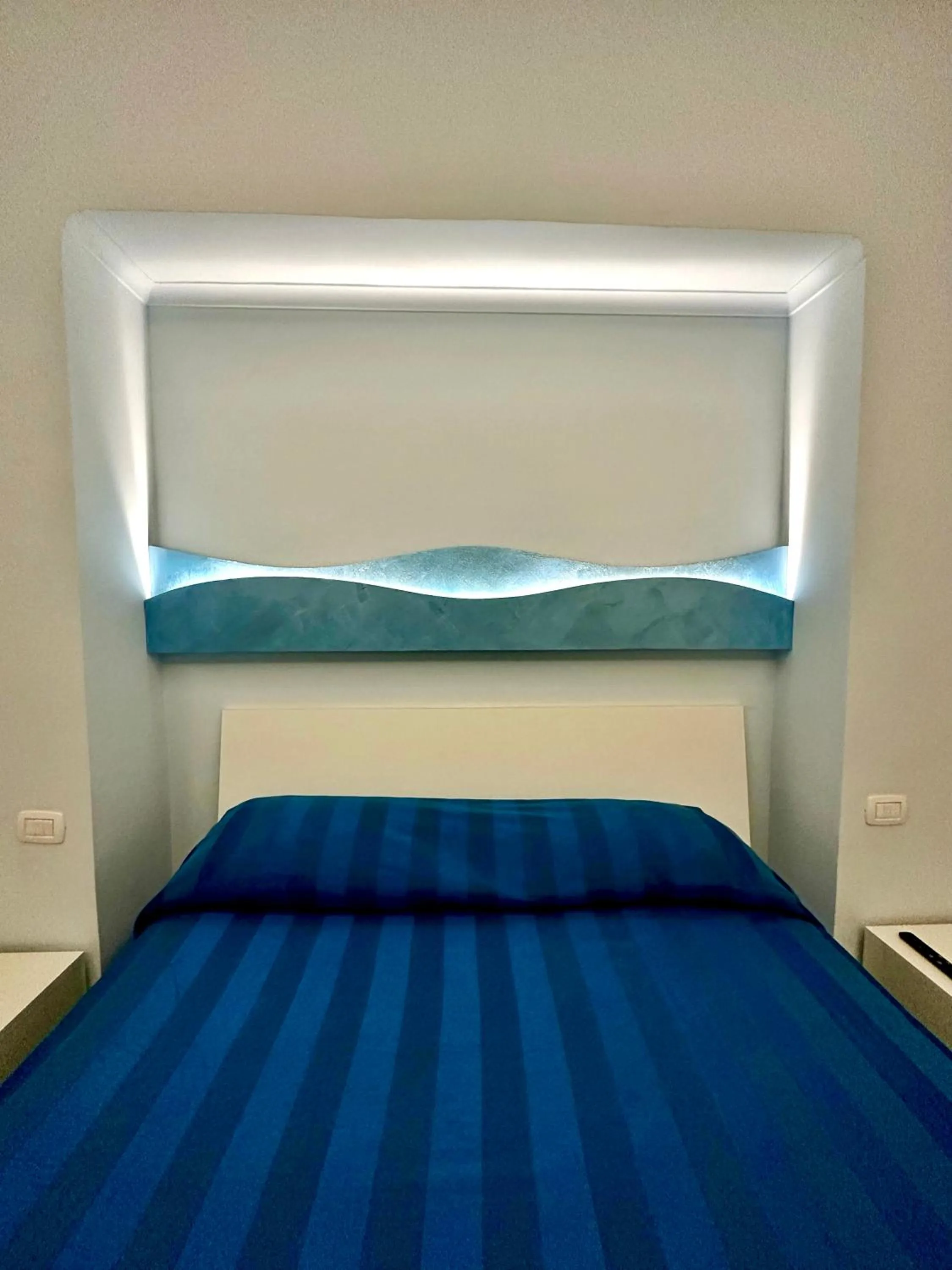 Bed in SoLuMa' Chiaja Rooms
