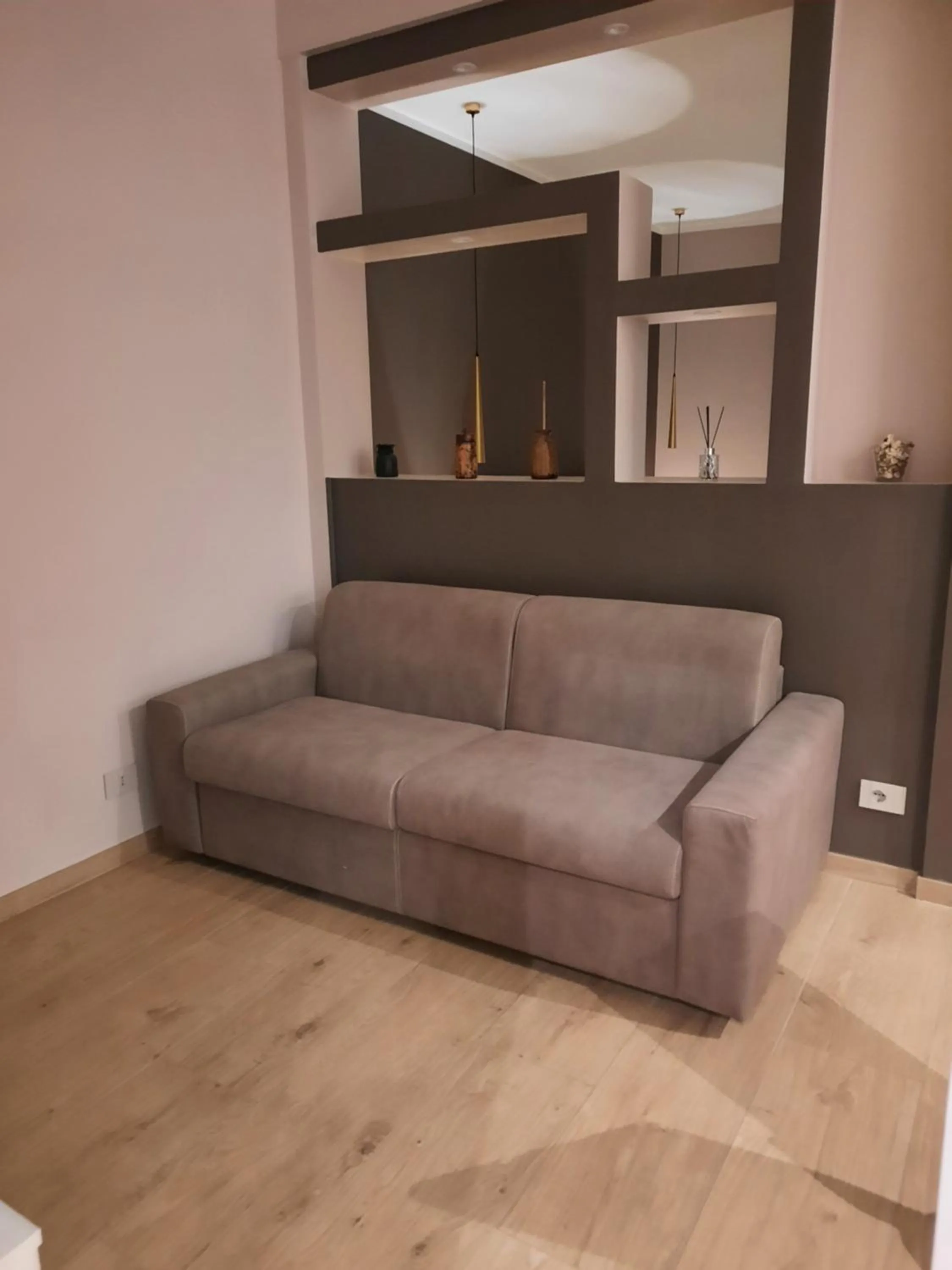 Seating area in Teseo Rooms & Relax