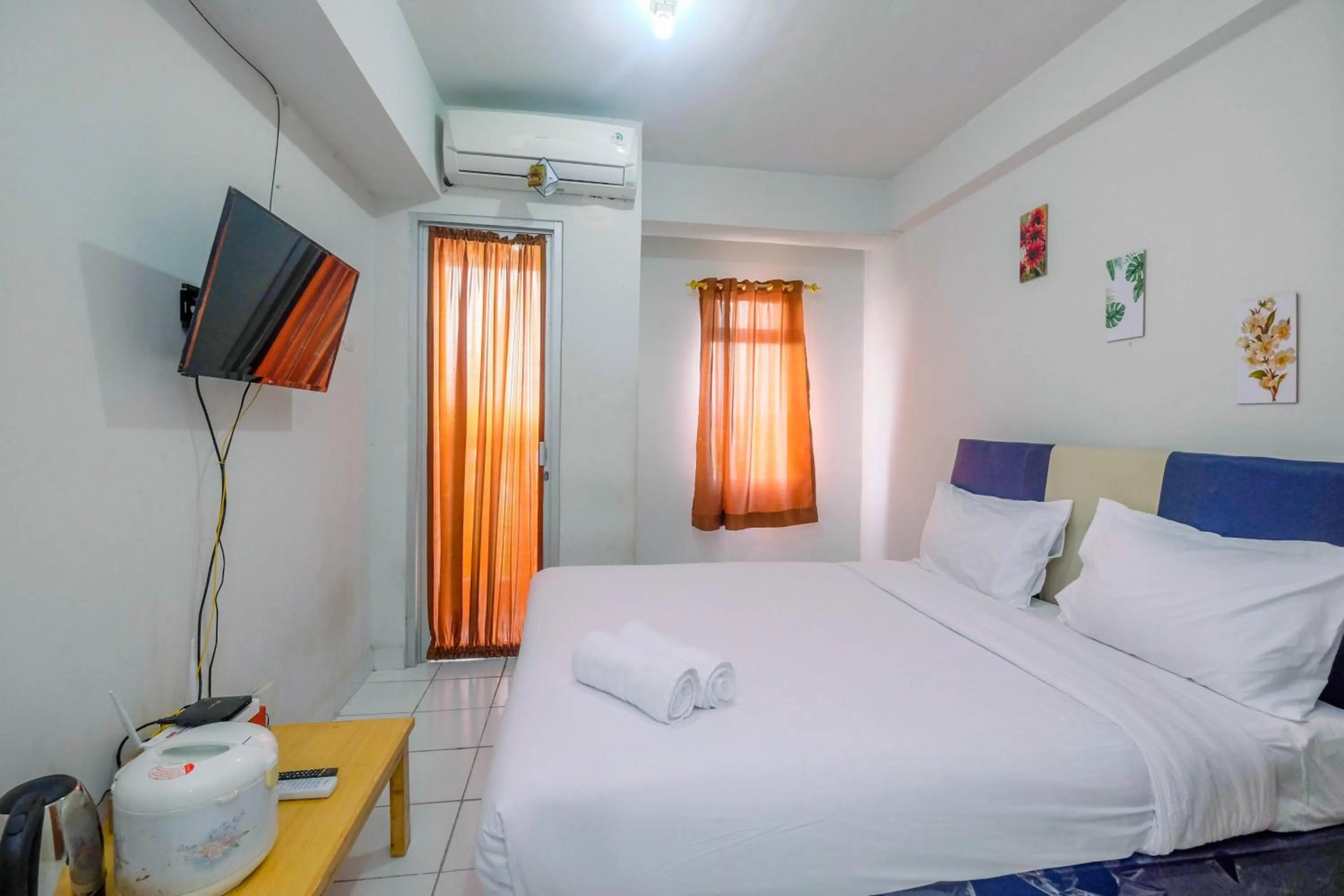 Bed in Comfortable and Homey Studio Apartment at Dramaga Tower near IPB By Travelio