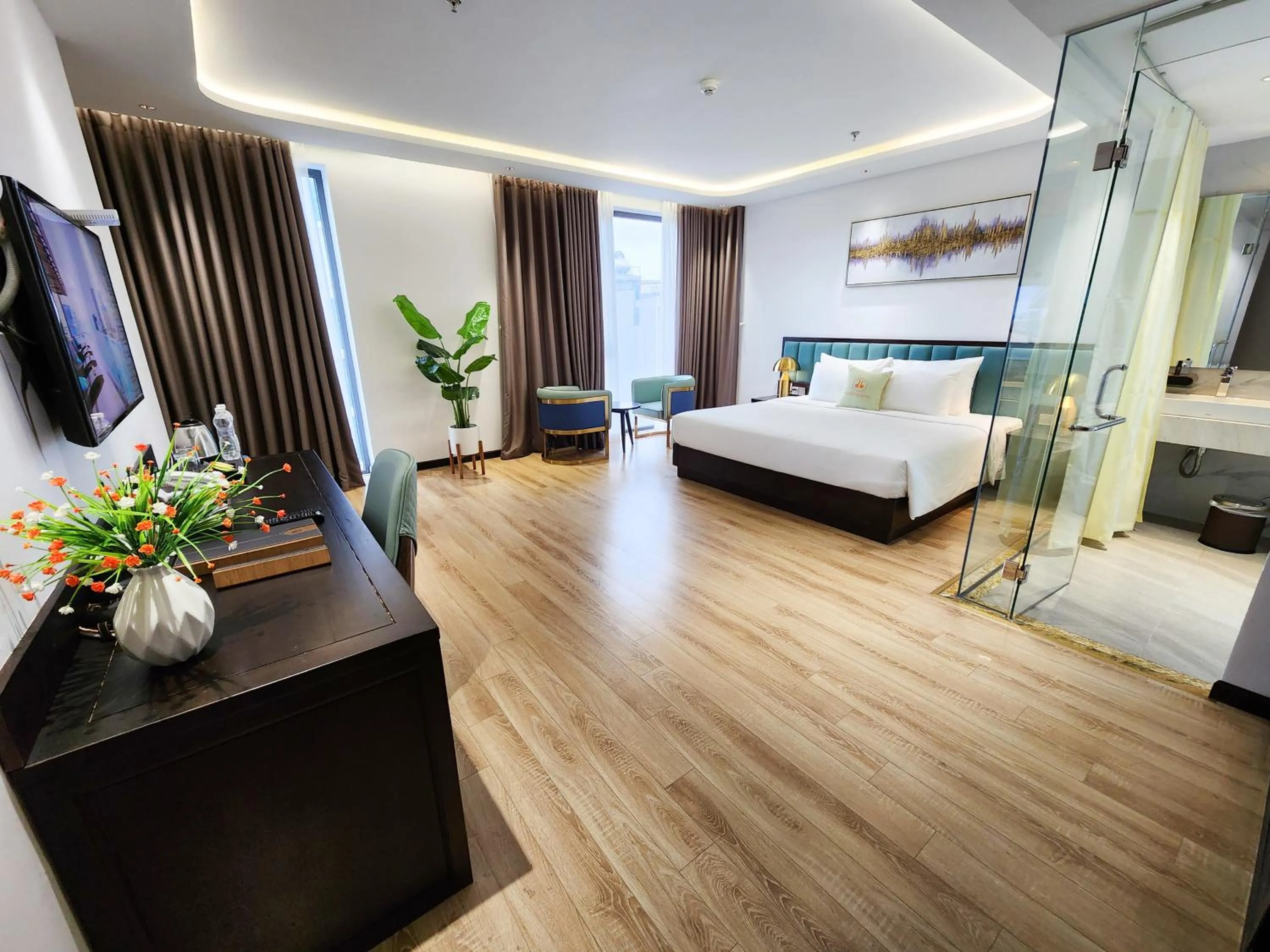 Communal lounge/ TV room, Bed in Cordial Grand Hotel Da Nang Beach - Infinity Rooftop Pool