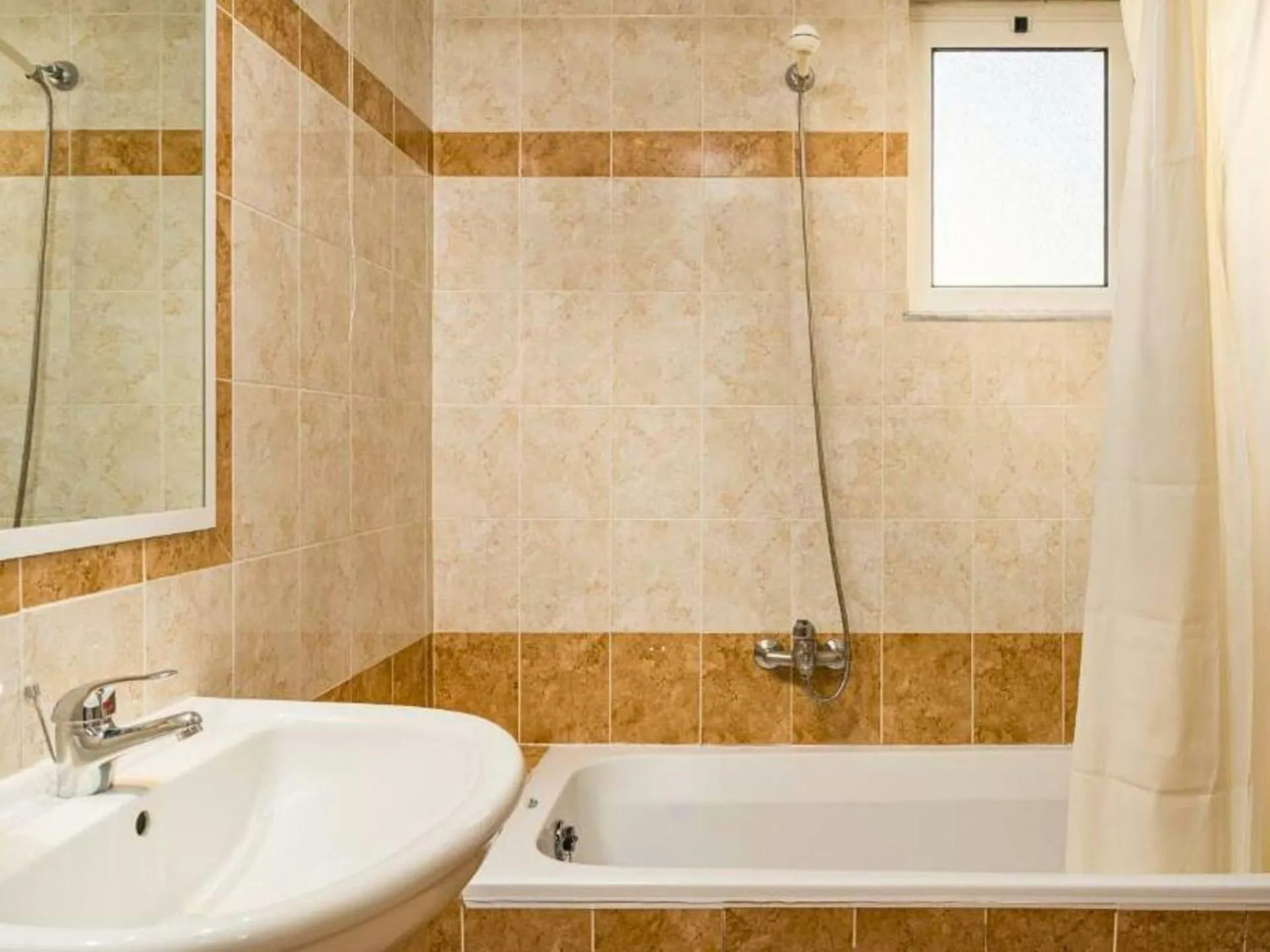 Shower in Manousis ApartHotel