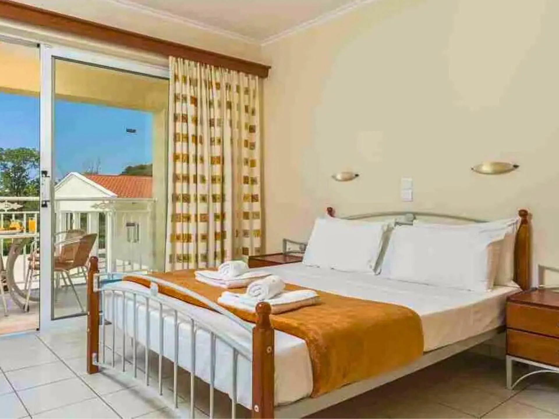 Bed in Manousis ApartHotel