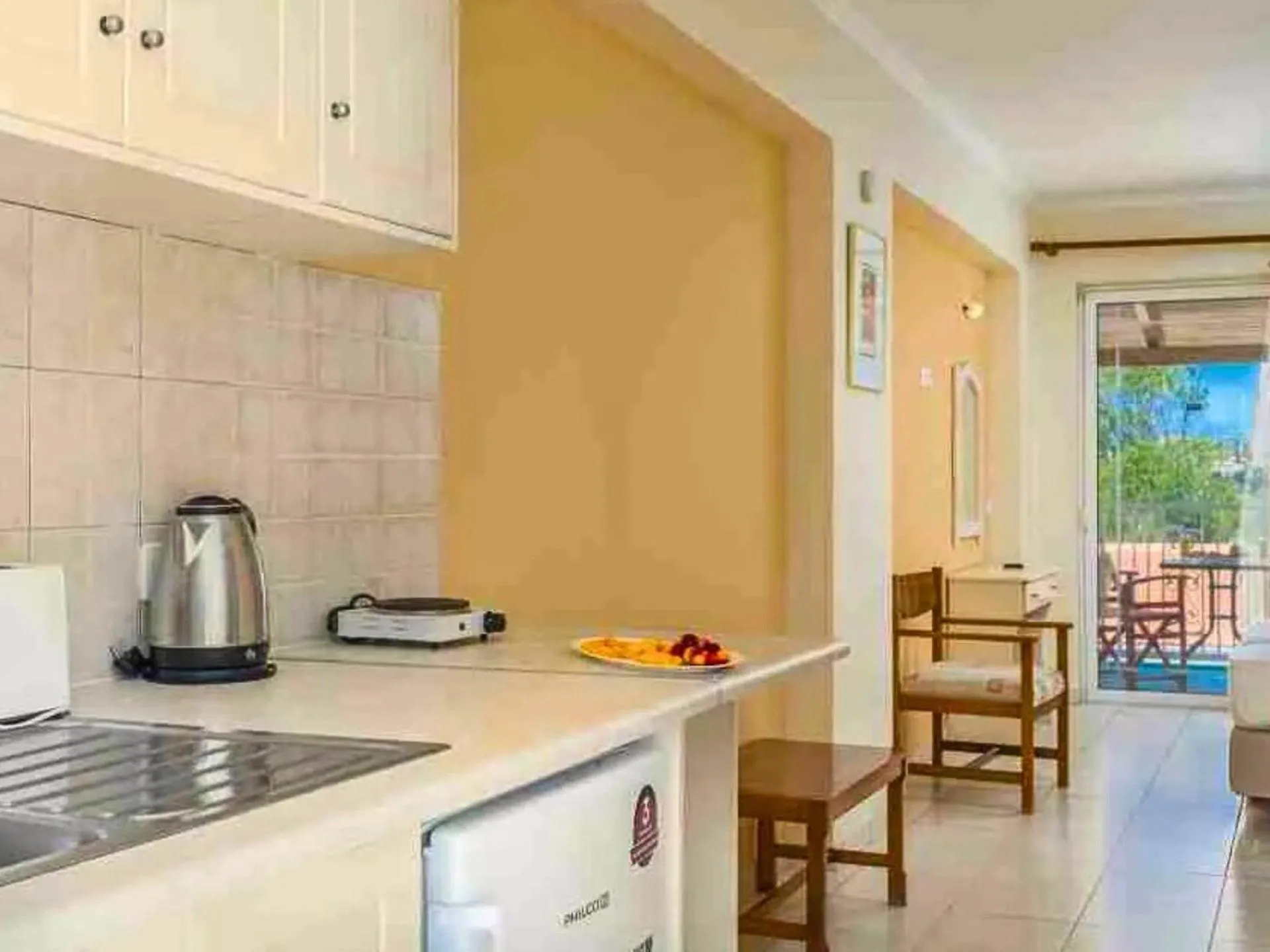 Kitchen or kitchenette in Manousis ApartHotel