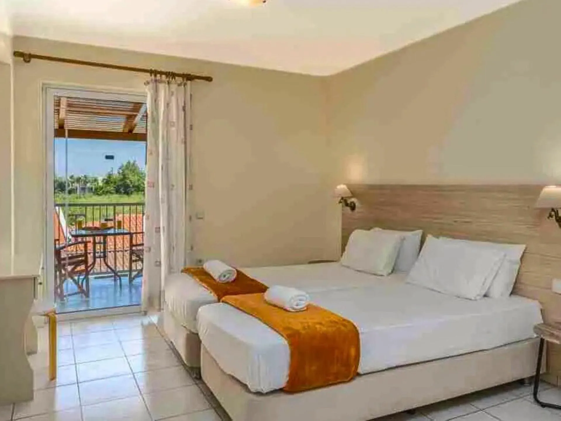 Bed in Manousis ApartHotel