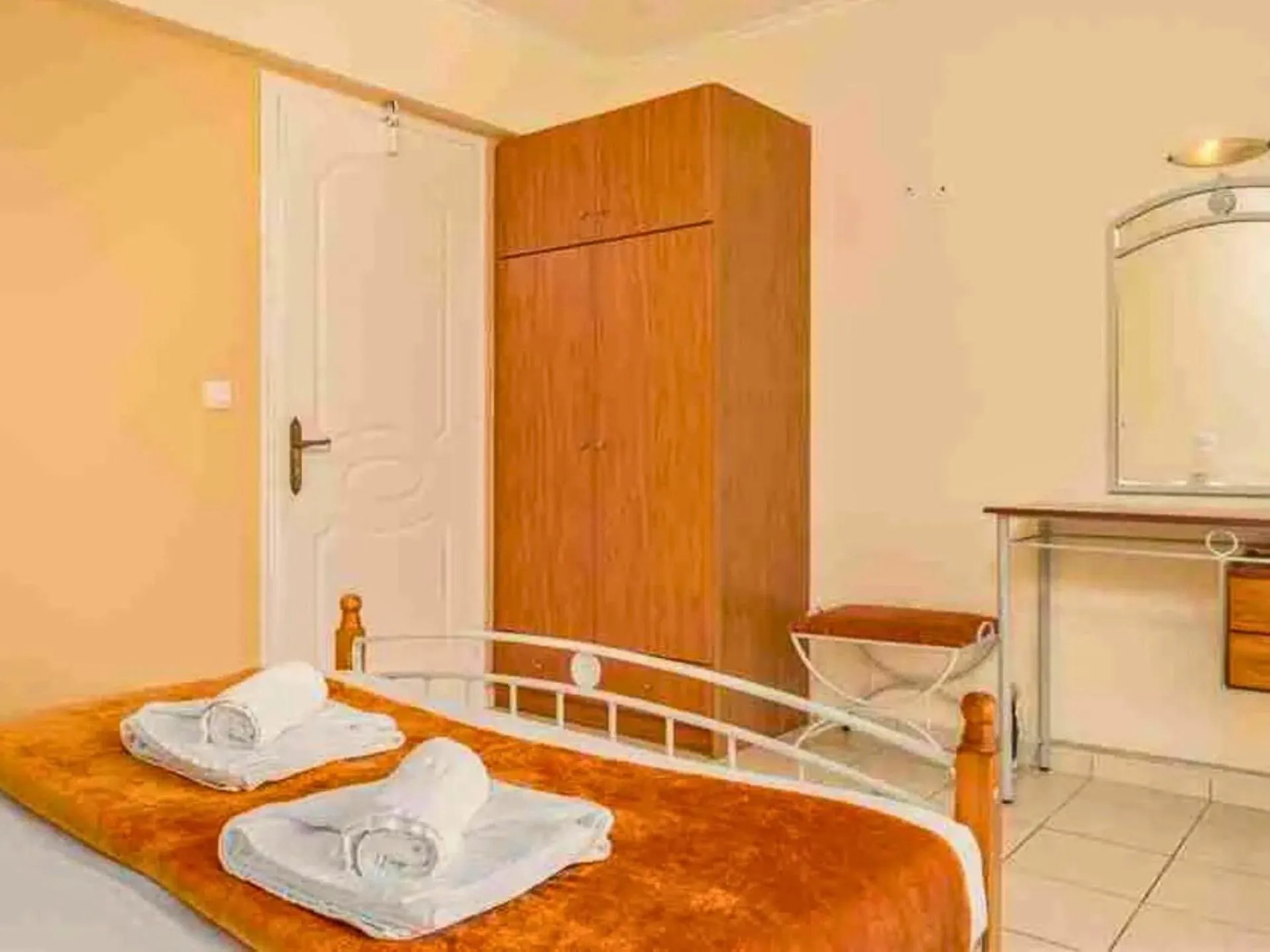 Bed in Manousis ApartHotel