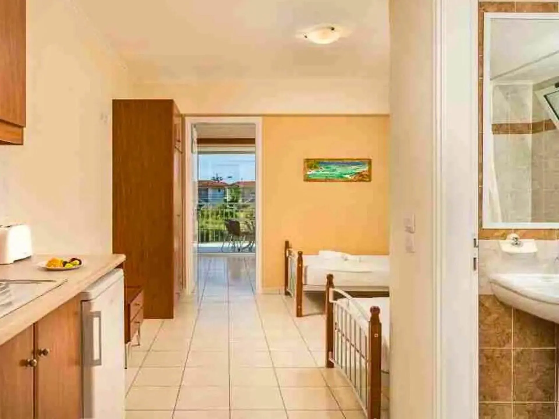 Bed in Manousis ApartHotel