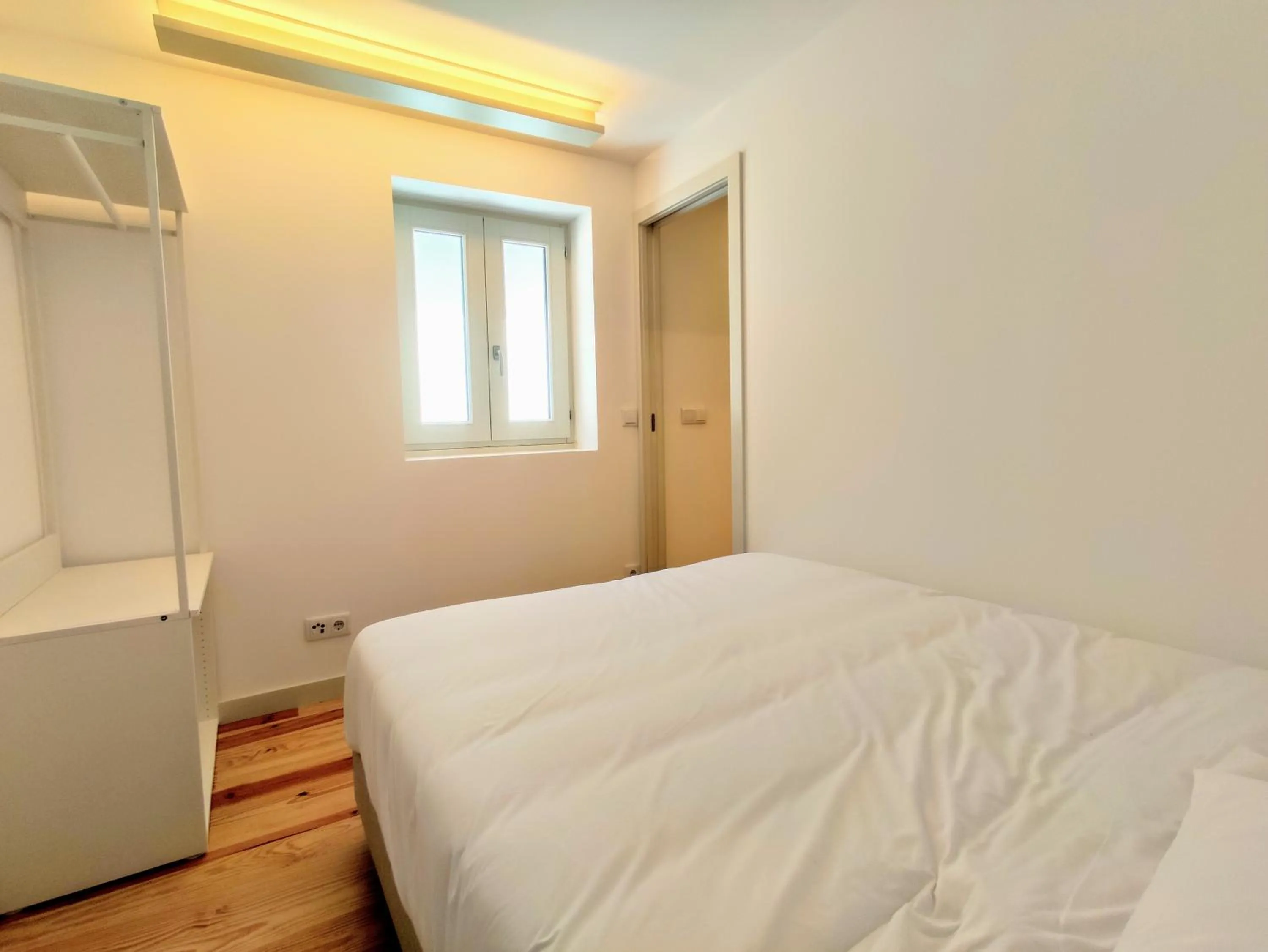 Bed in Bombarda Cinema Apartments