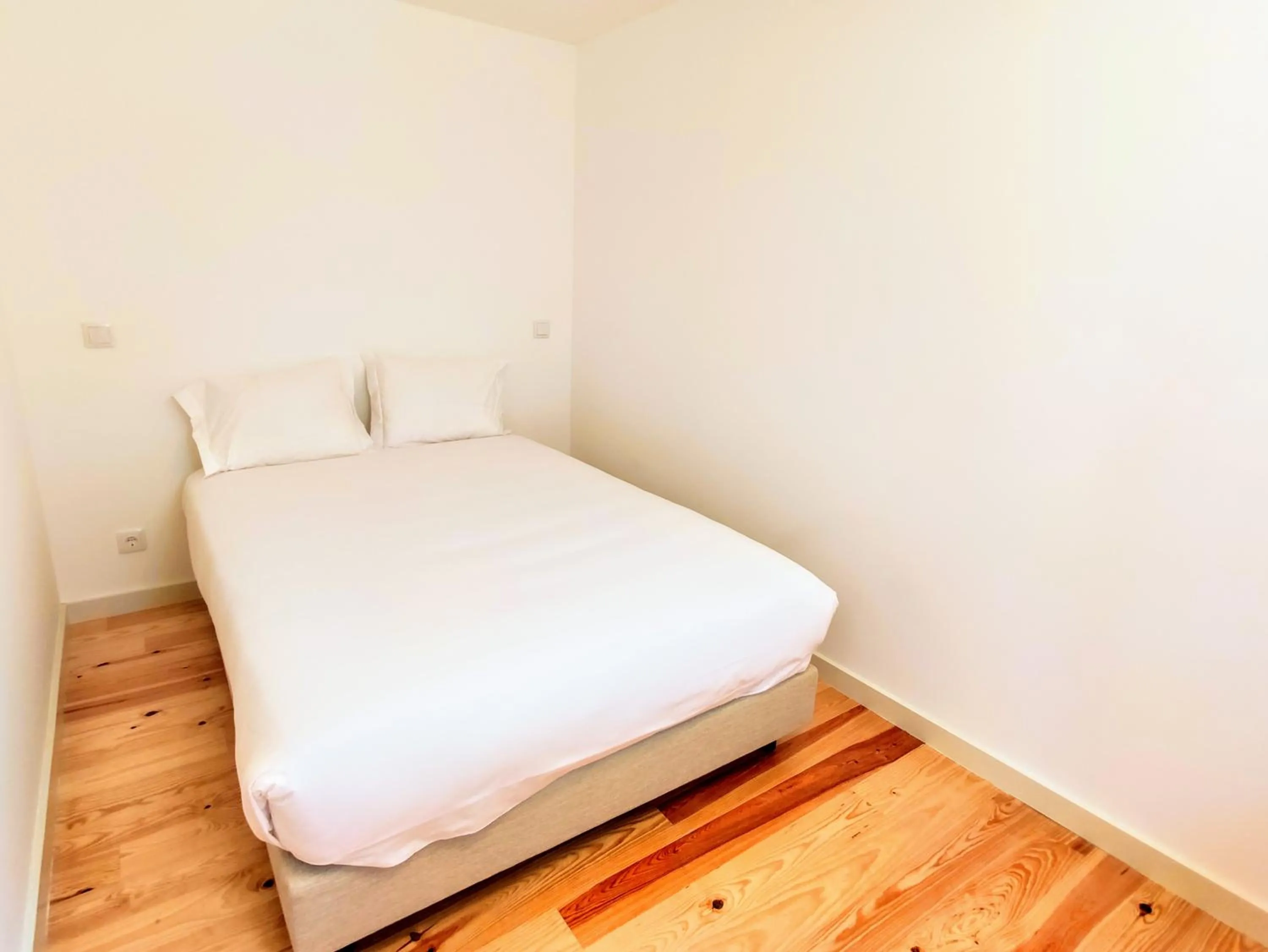 Bed in Bombarda Cinema Apartments