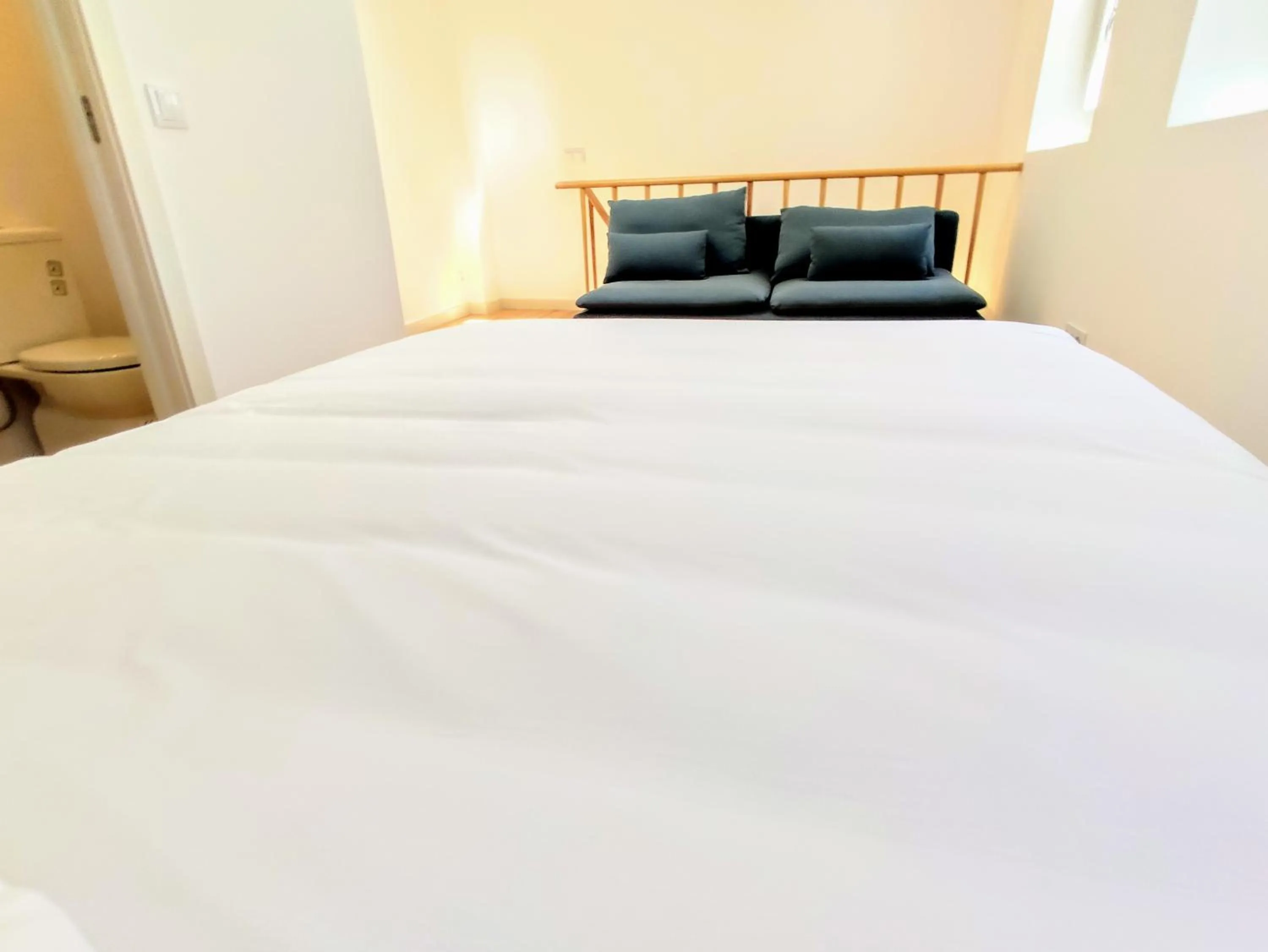 Bed in Bombarda Cinema Apartments