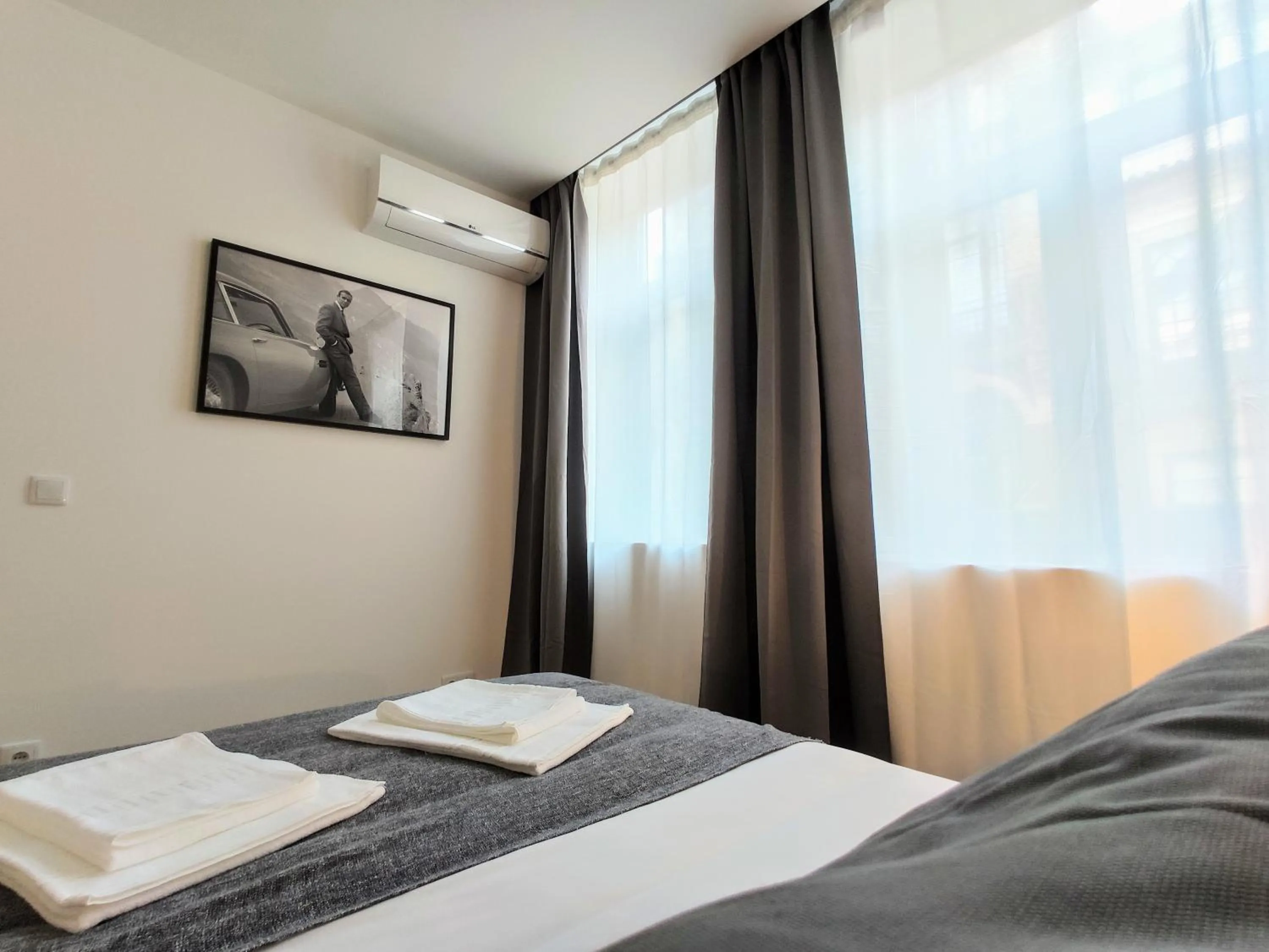 Bedroom in Bombarda Cinema Apartments