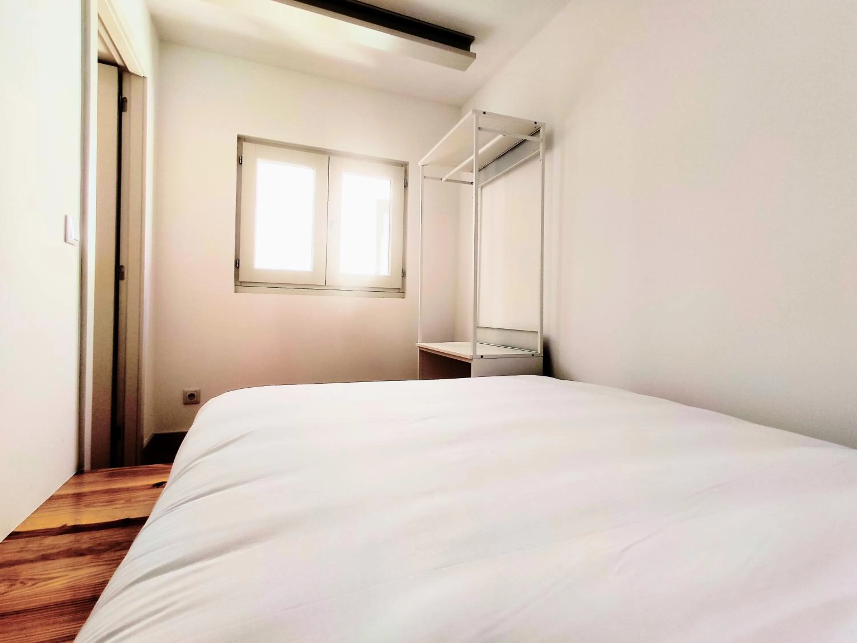 Bed in Bombarda Cinema Apartments