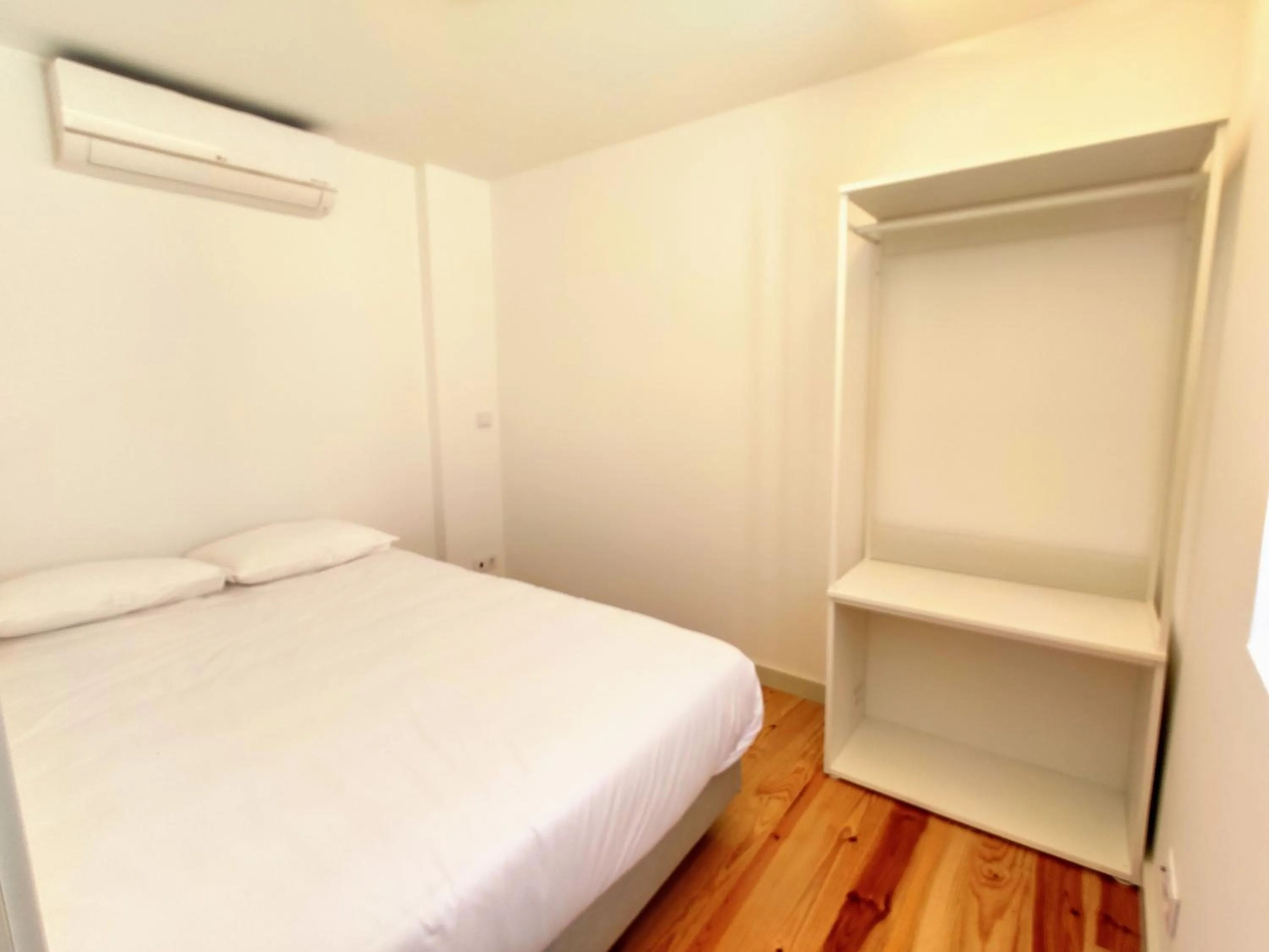 Bed in Bombarda Cinema Apartments