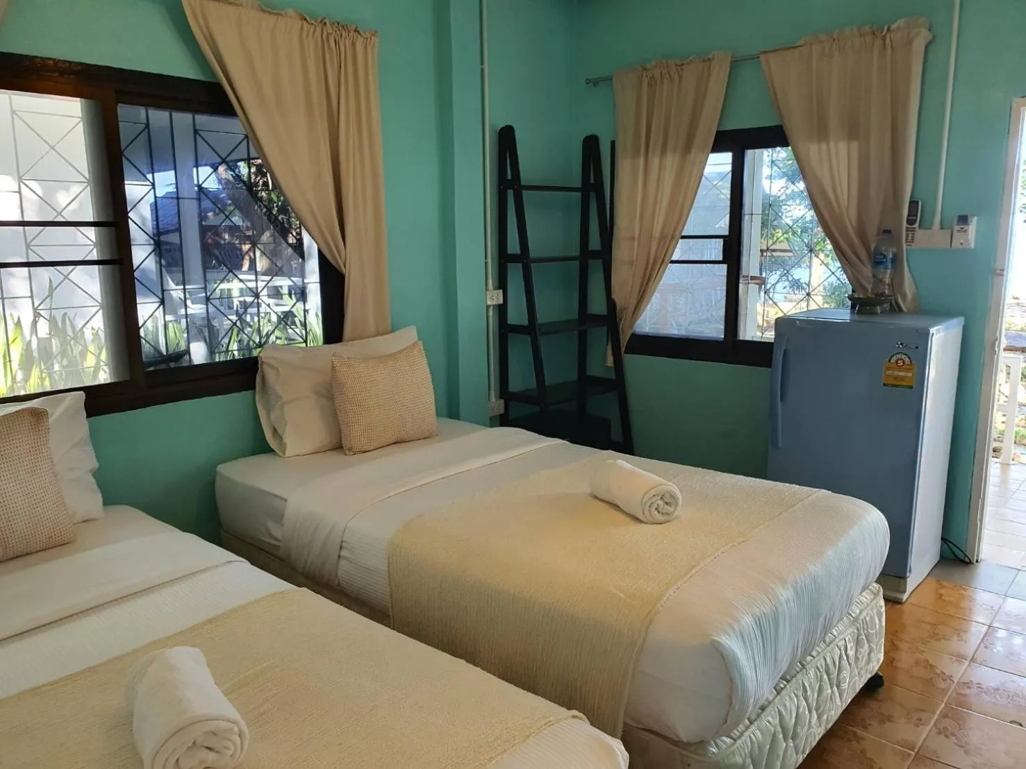 Bed in Blue Bay Bungalow