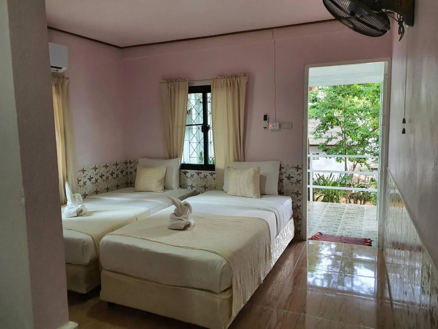 Bed in Blue Bay Bungalow