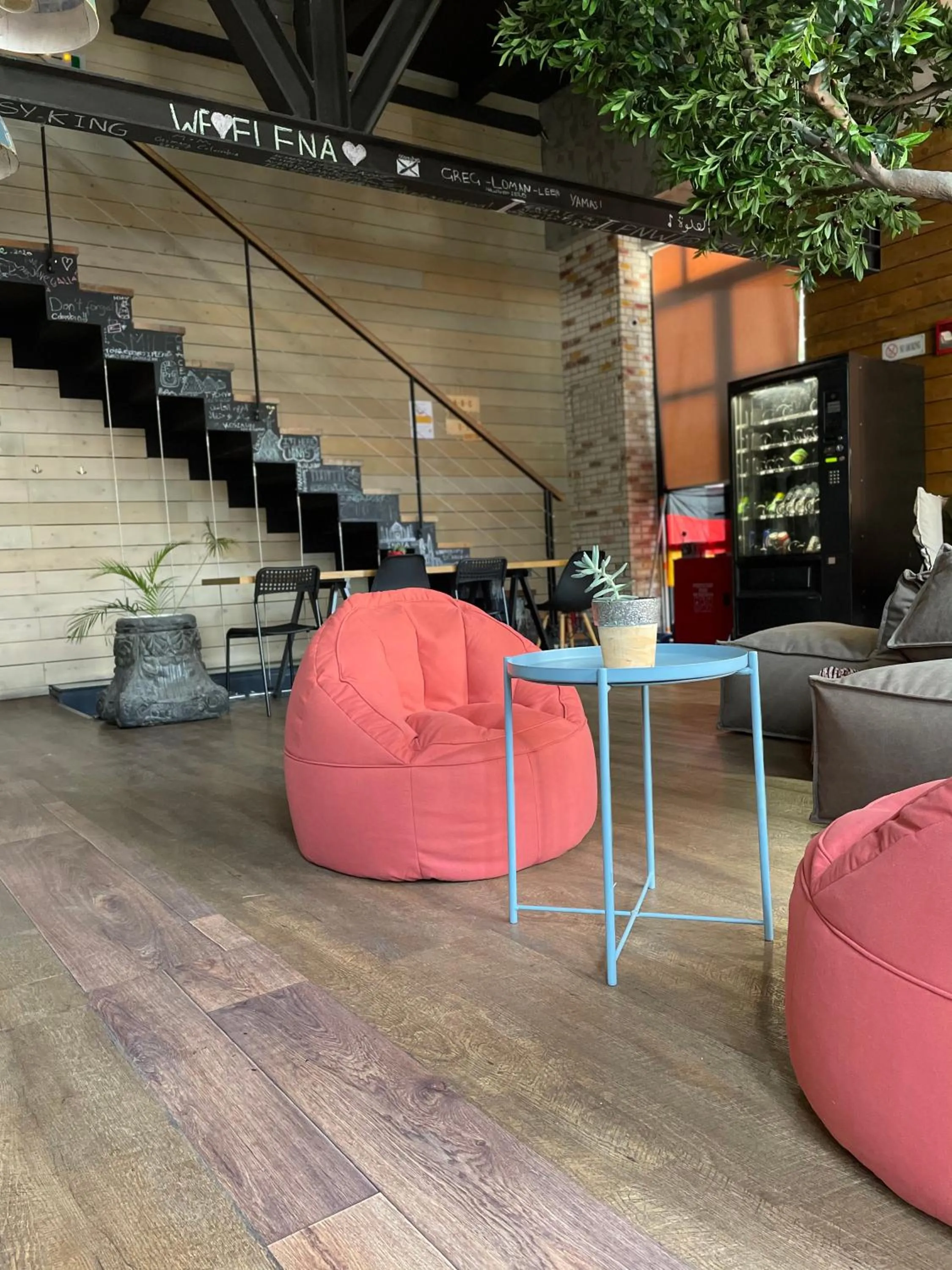 Communal lounge/ TV room in Iconic Athens Hostel