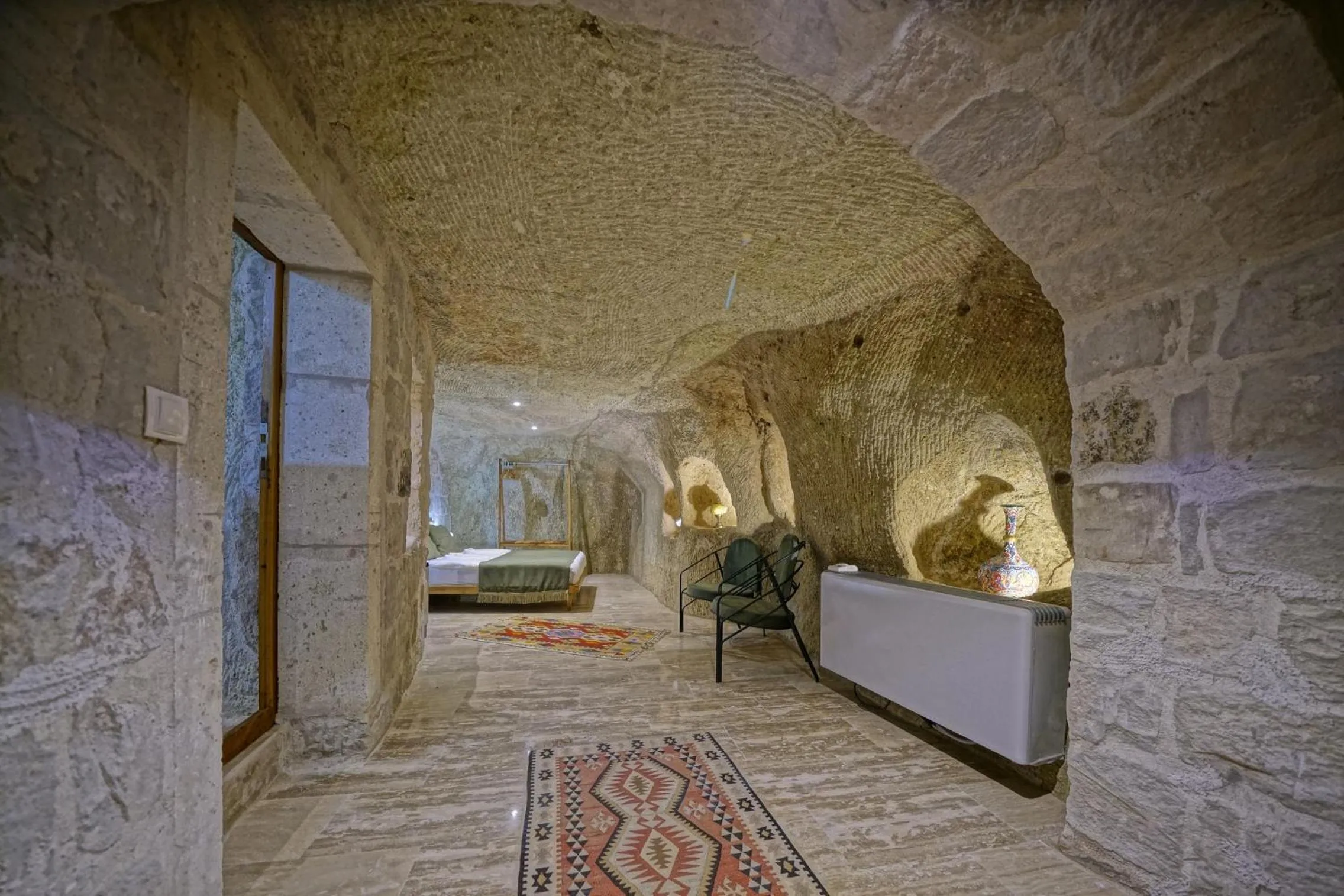 Bed in Vigneron Cave Hotel