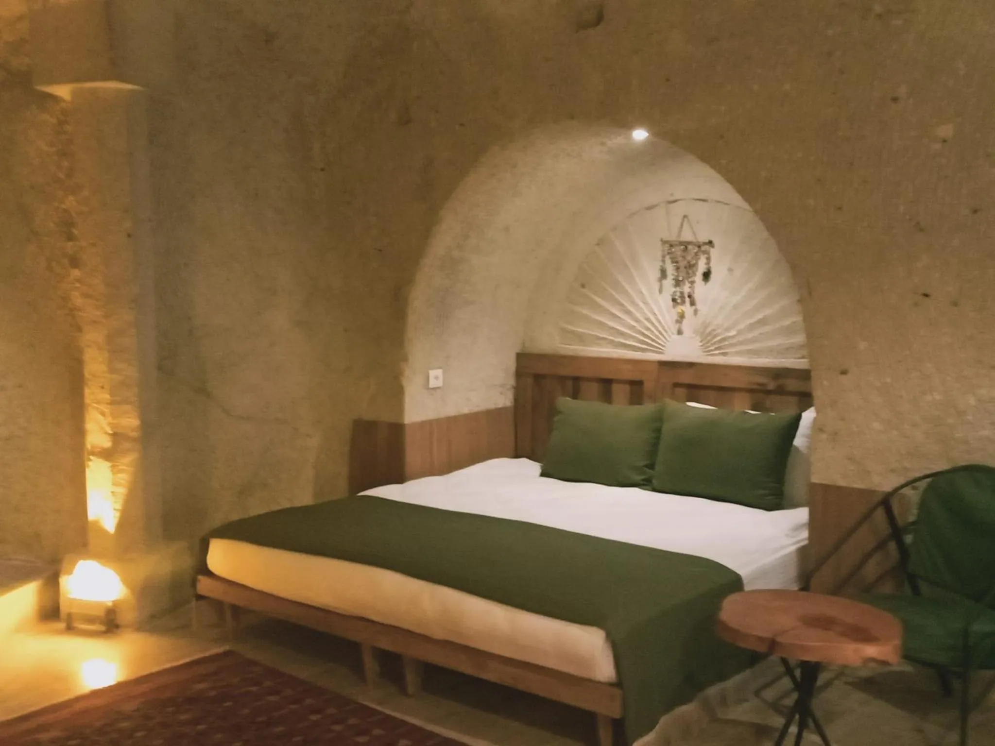 Bed in Vigneron Cave Hotel