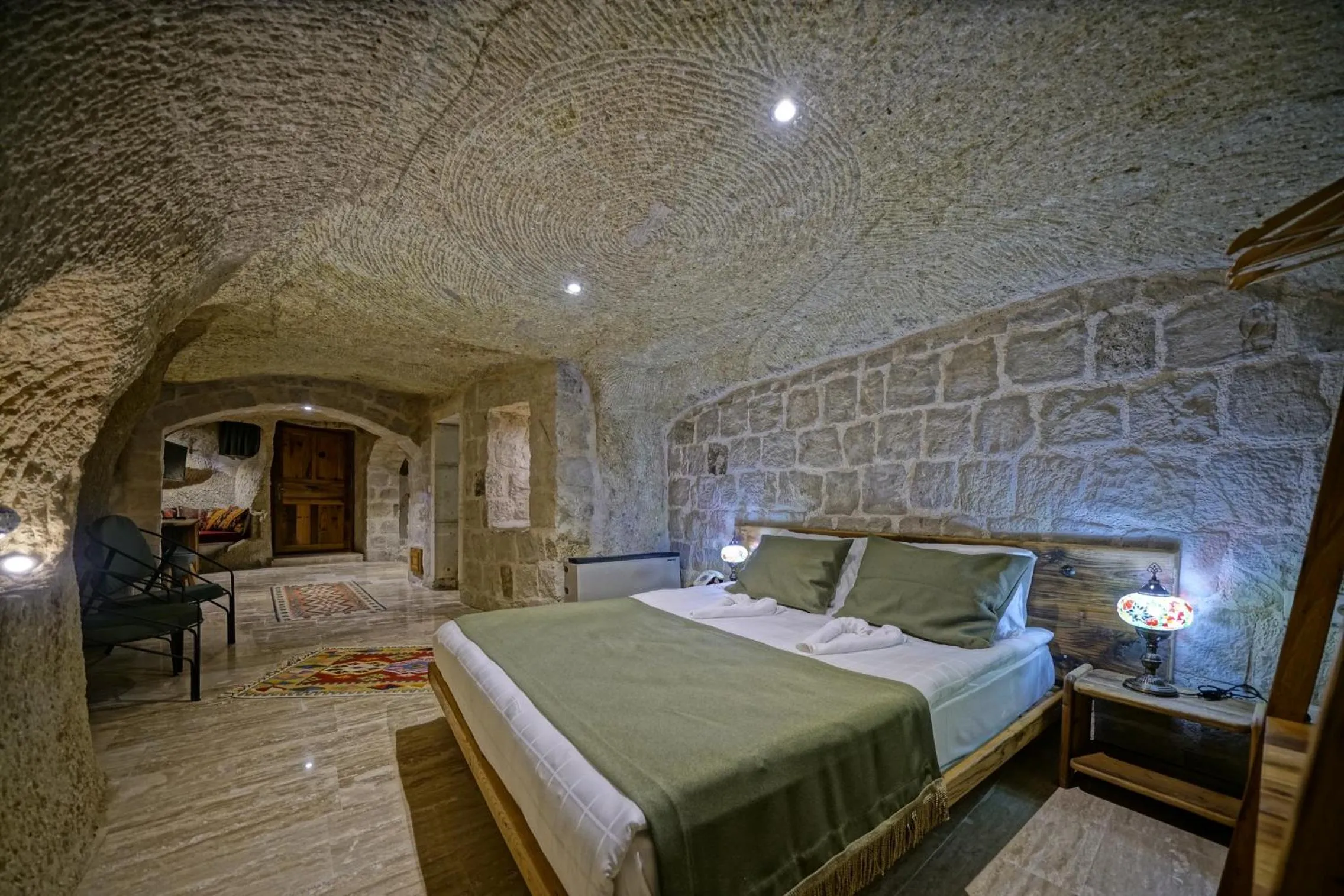 Bed in Vigneron Cave Hotel
