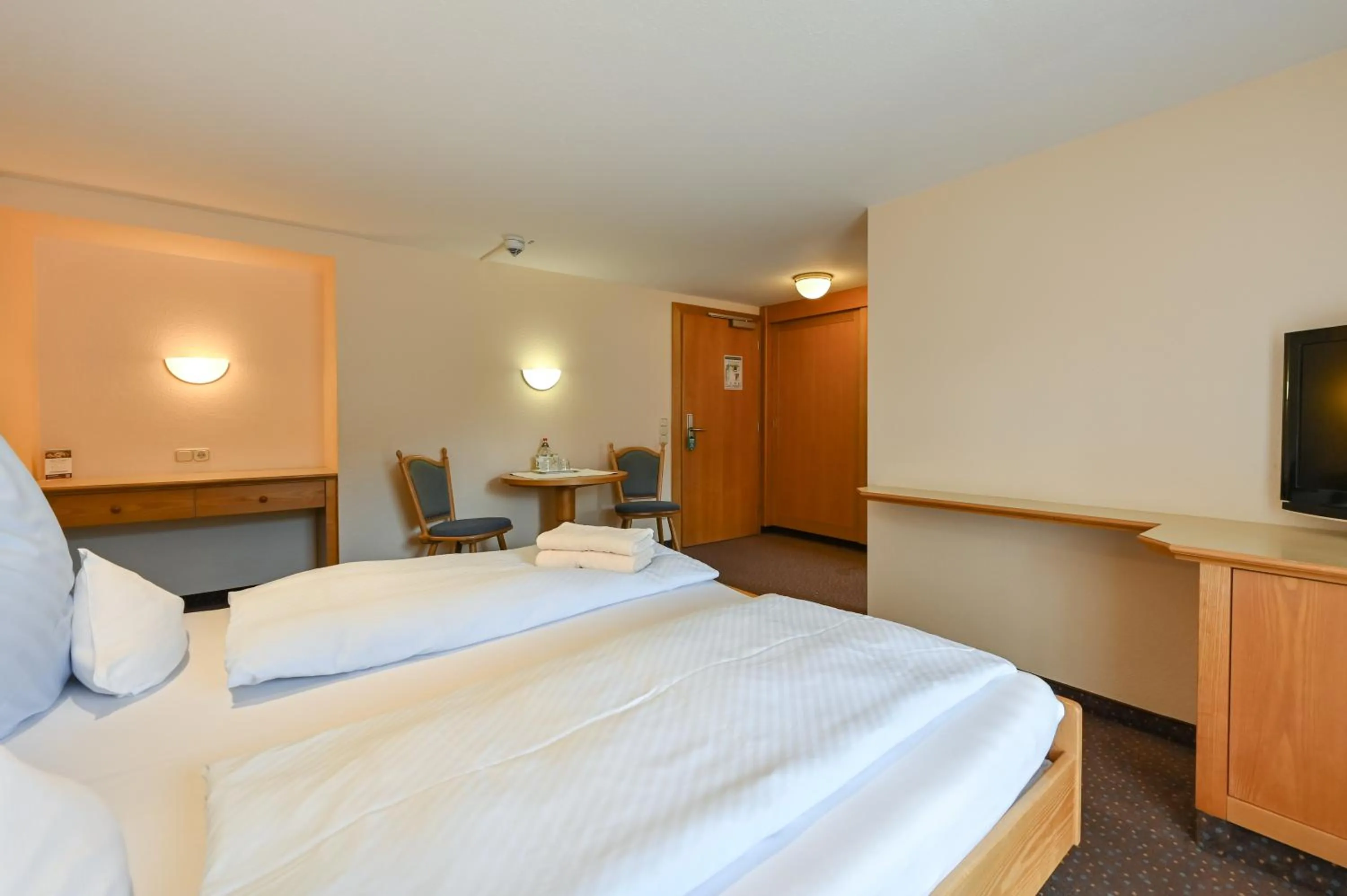 Bed in Hotel Weinbauer