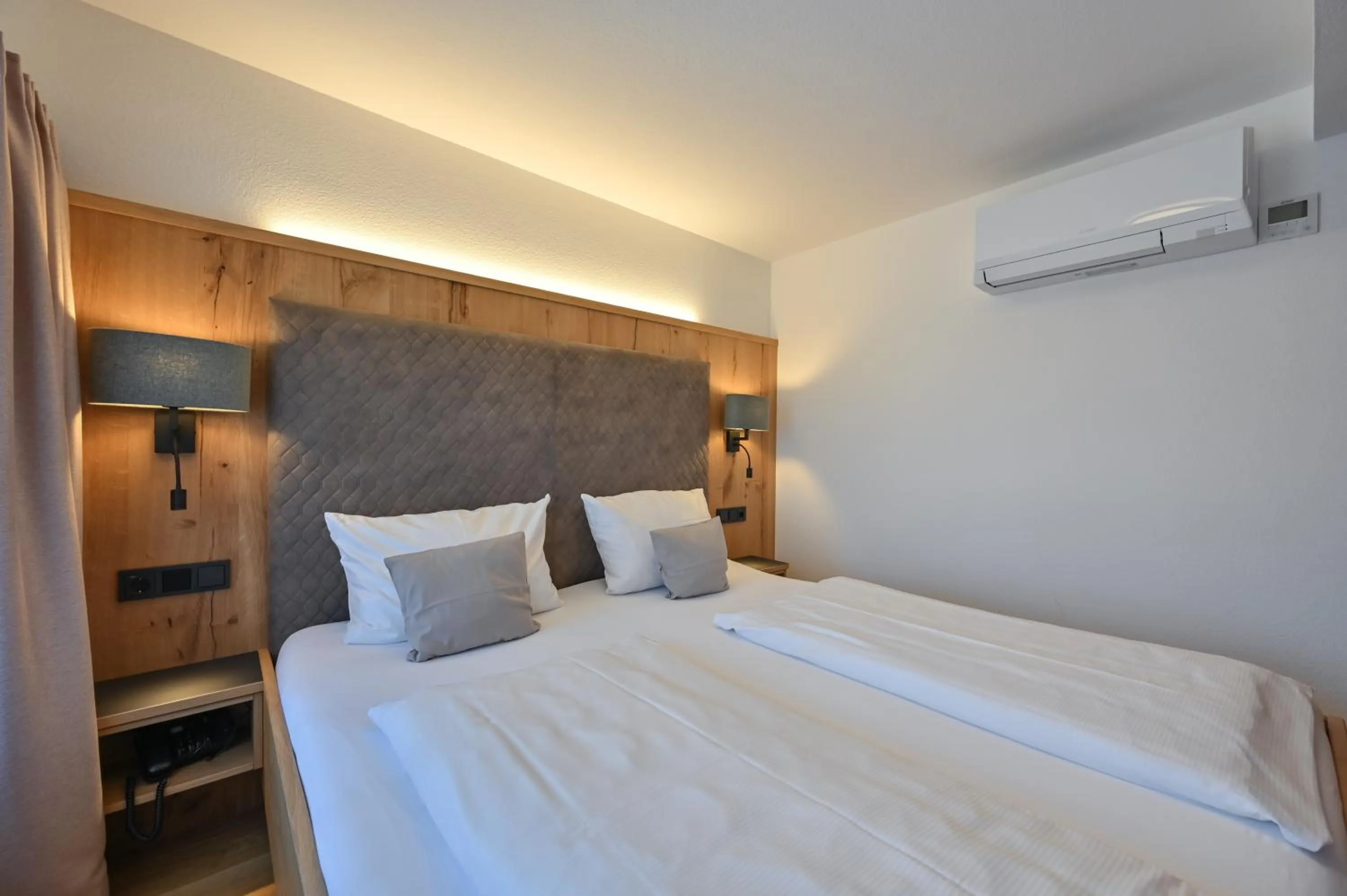 Bed in Hotel Weinbauer