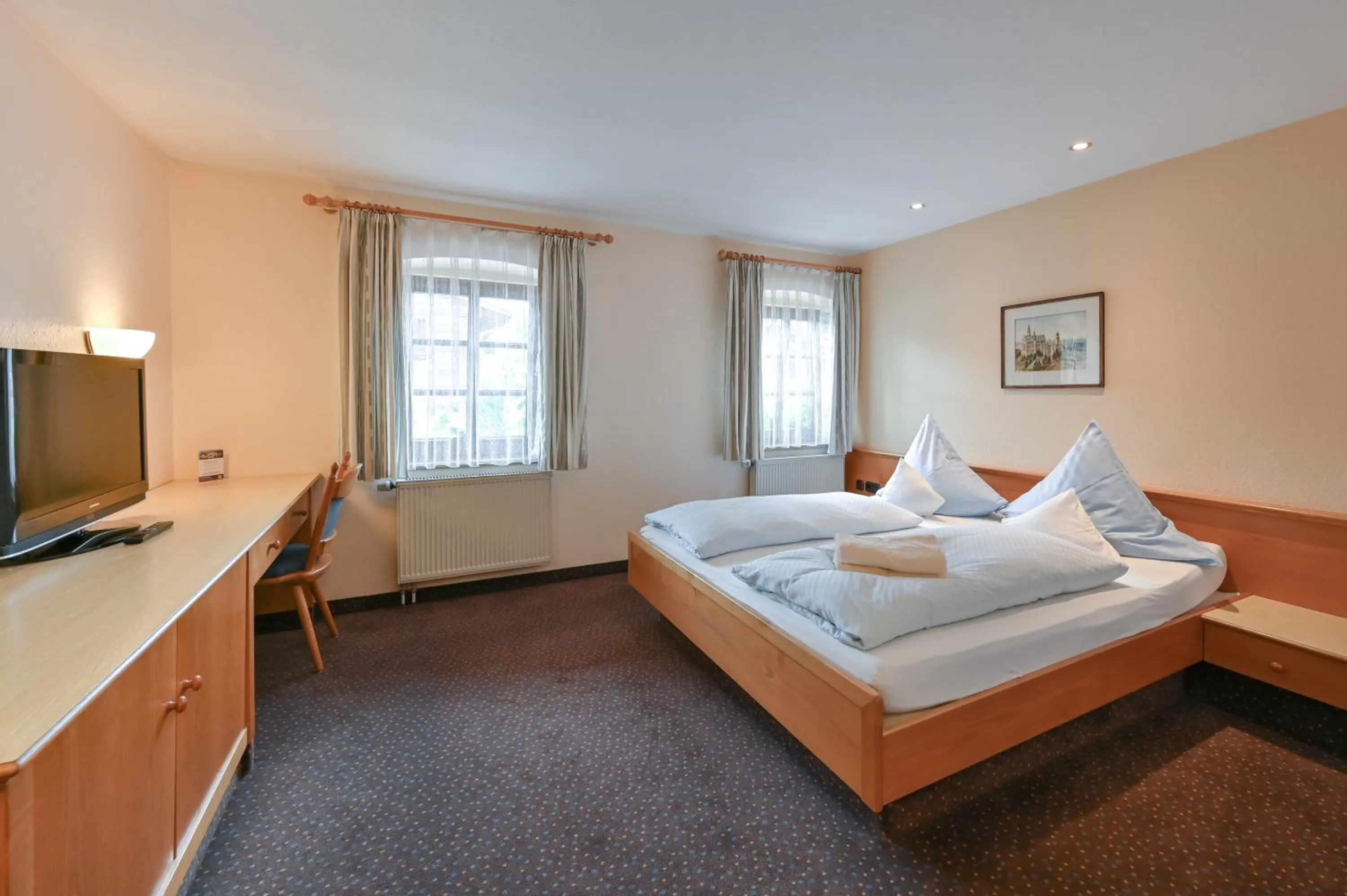 Bed in Hotel Weinbauer