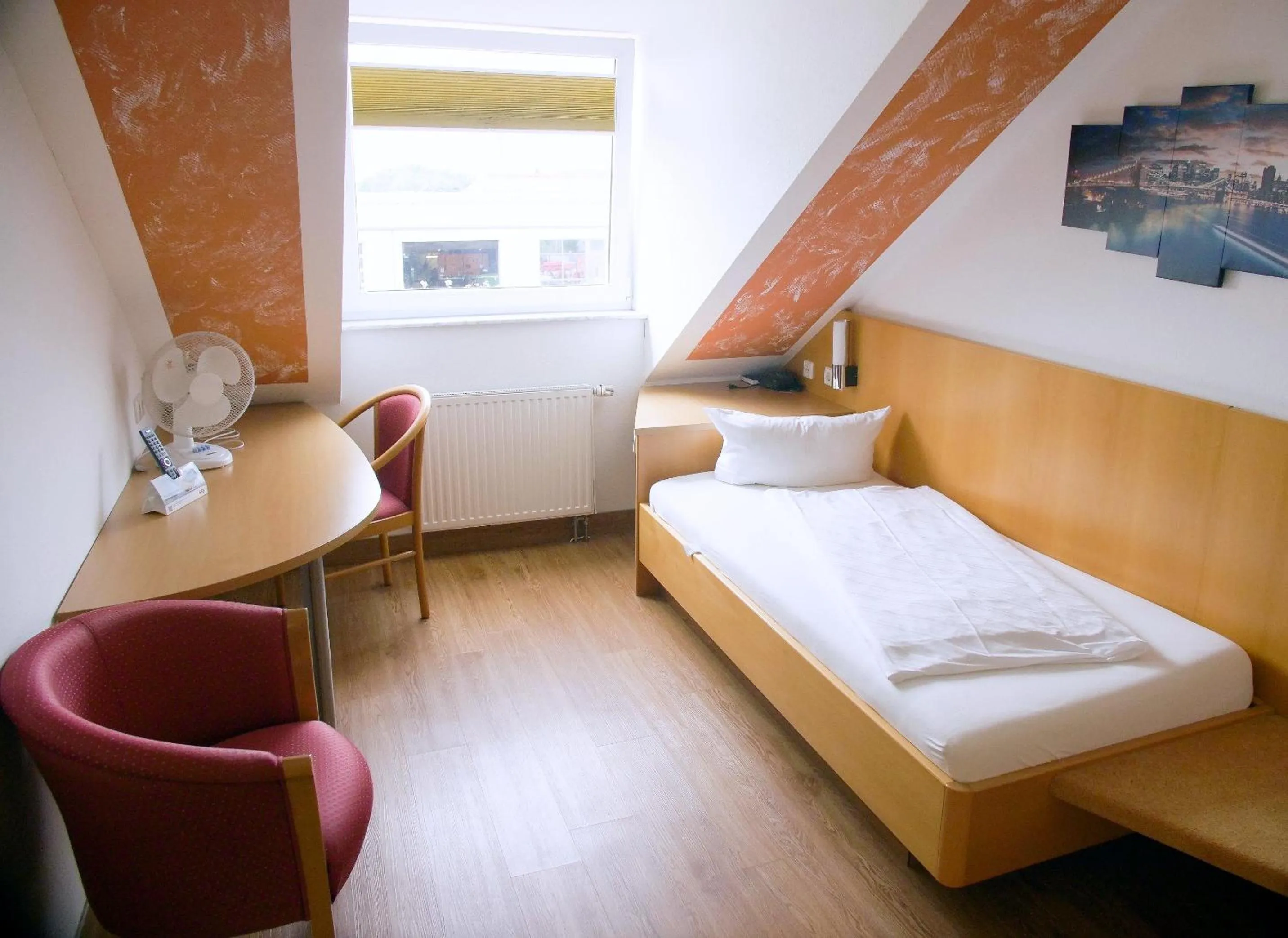 Photo of the whole room, Bed in Hotel SunParc - SHUTTLE zum Europa-Park Rust 4km & Rulantica 2km