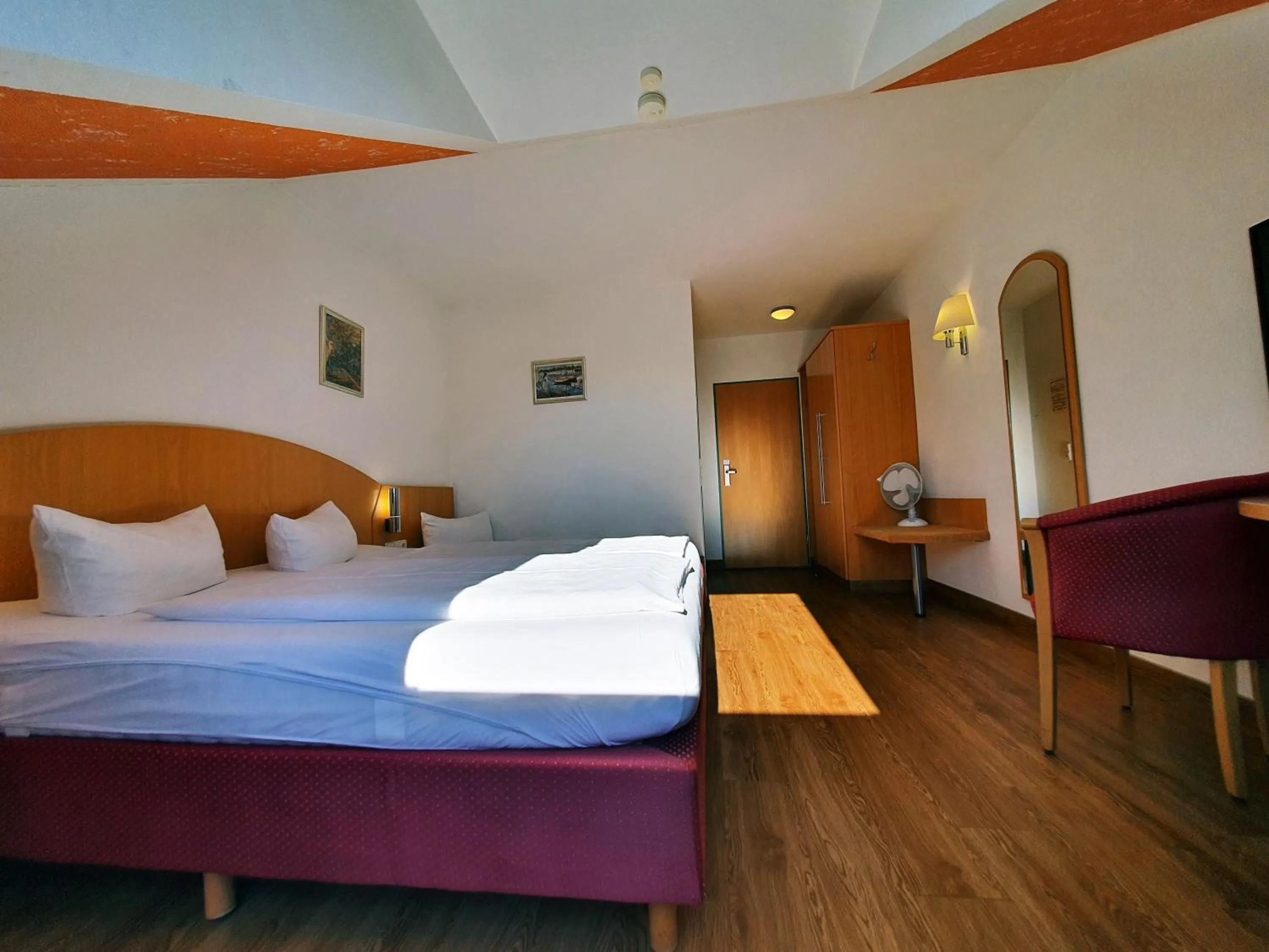 Photo of the whole room, Bed in Hotel SunParc - SHUTTLE zum Europa-Park Rust 4km & Rulantica 2km