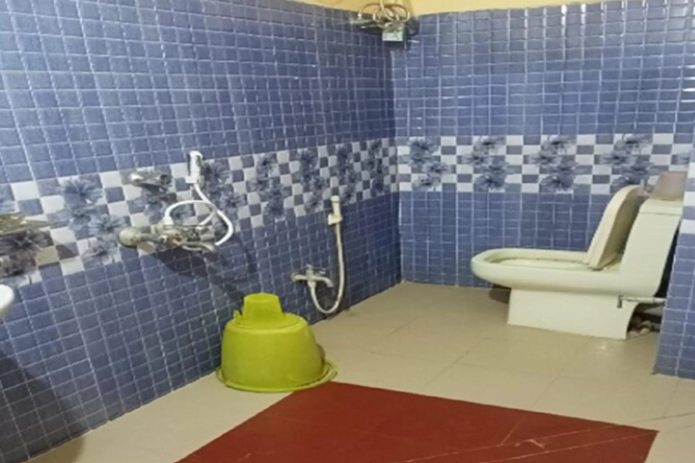 Bathroom in Galaxy Inn by StayApart