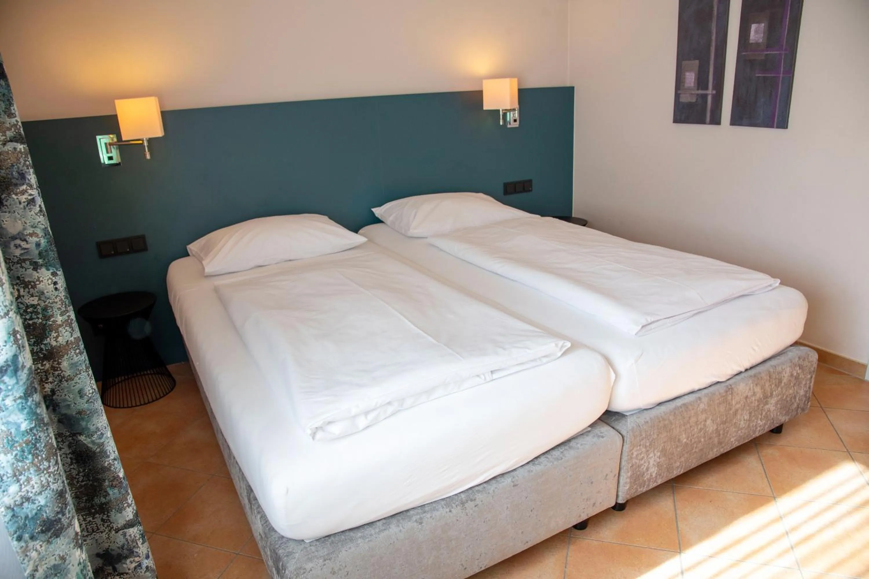 Photo of the whole room, Bed in Ringhotel Reubel