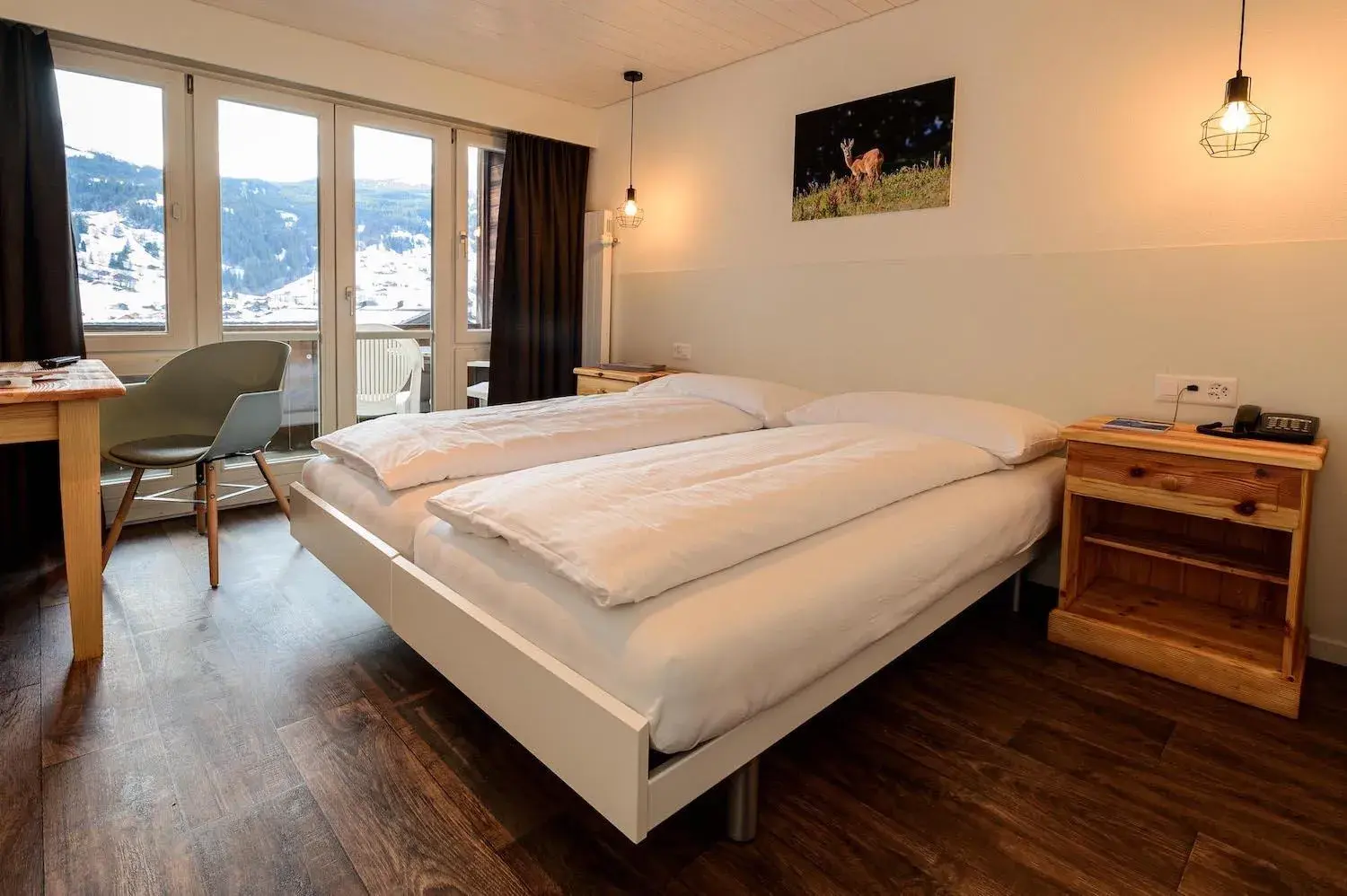 Photo of the whole room, Bed in Jungfrau Lodge, Swiss Mountain Hotel Photo of the whole room, Bed in Jungfrau Lodge, Swiss Mountain Hotel