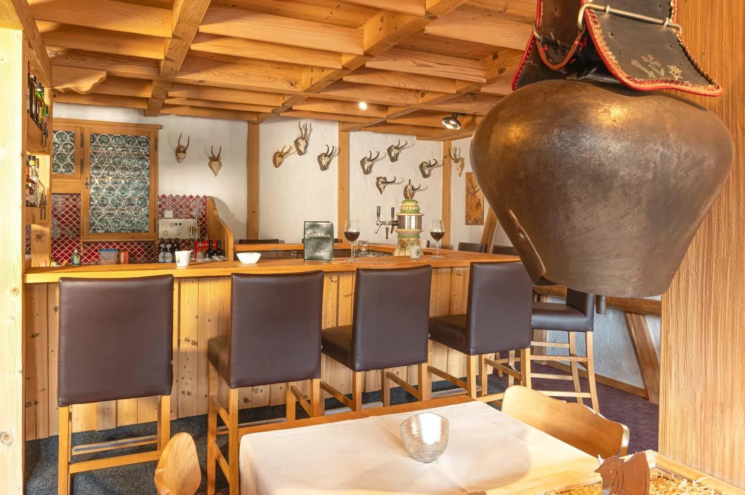 Lounge or bar in Jungfrau Lodge, Swiss Mountain Hotel