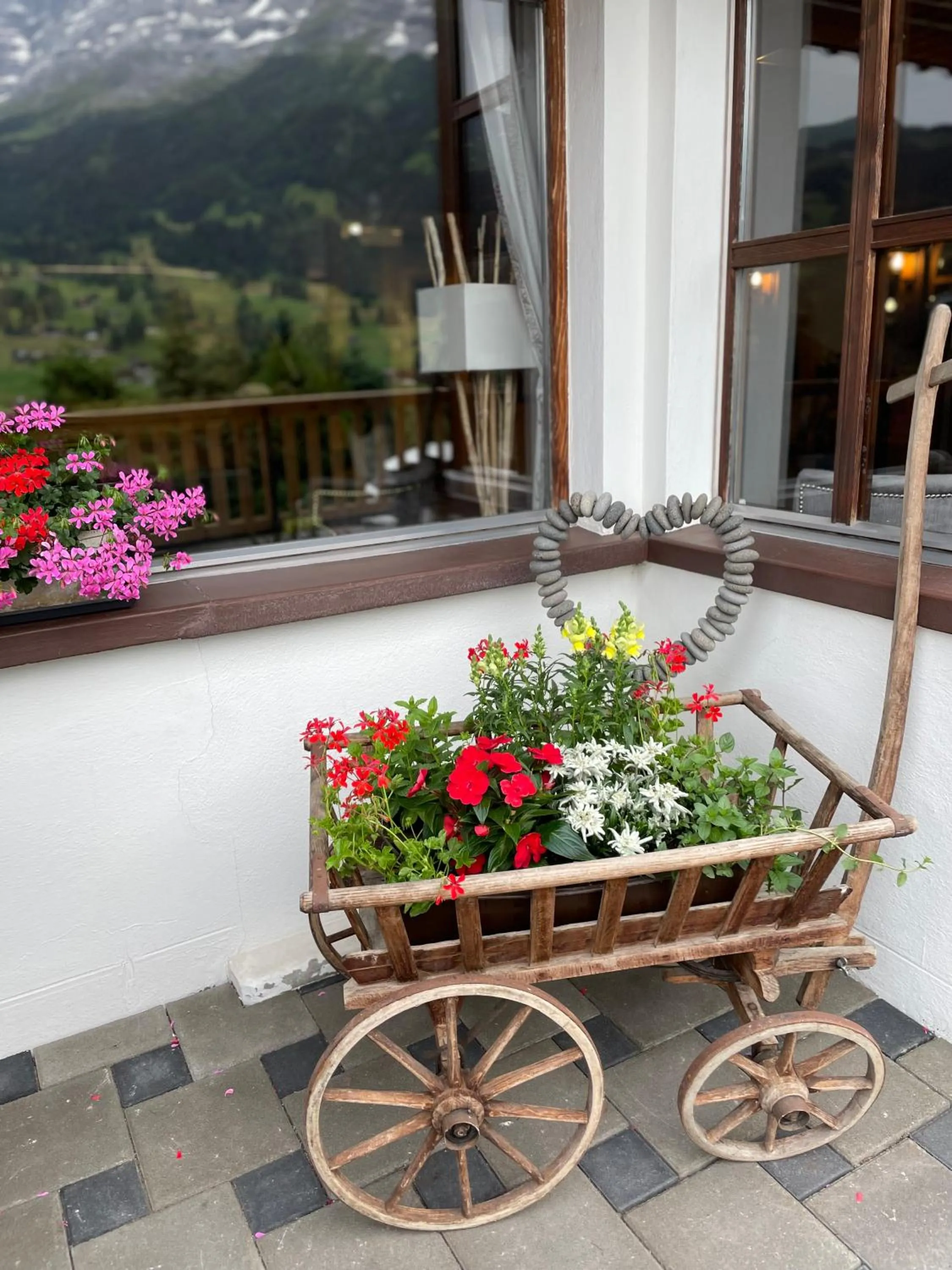 Garden in Jungfrau Lodge, Swiss Mountain Hotel