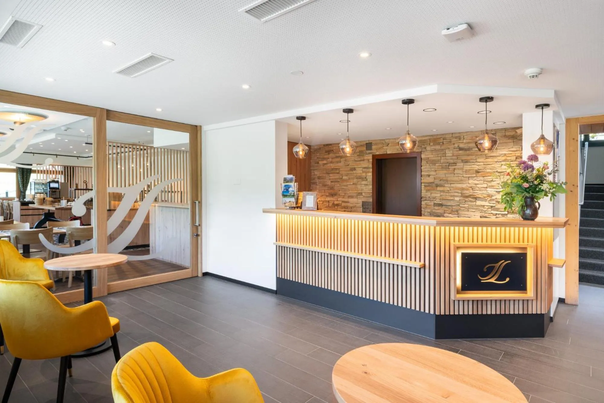 Lobby or reception in Jungfrau Lodge, Swiss Mountain Hotel