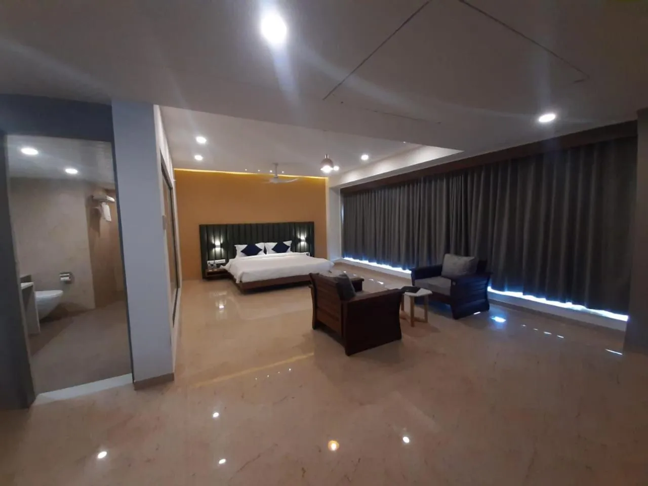 Photo of the whole room, Bed in VITS The Somnath Gateway