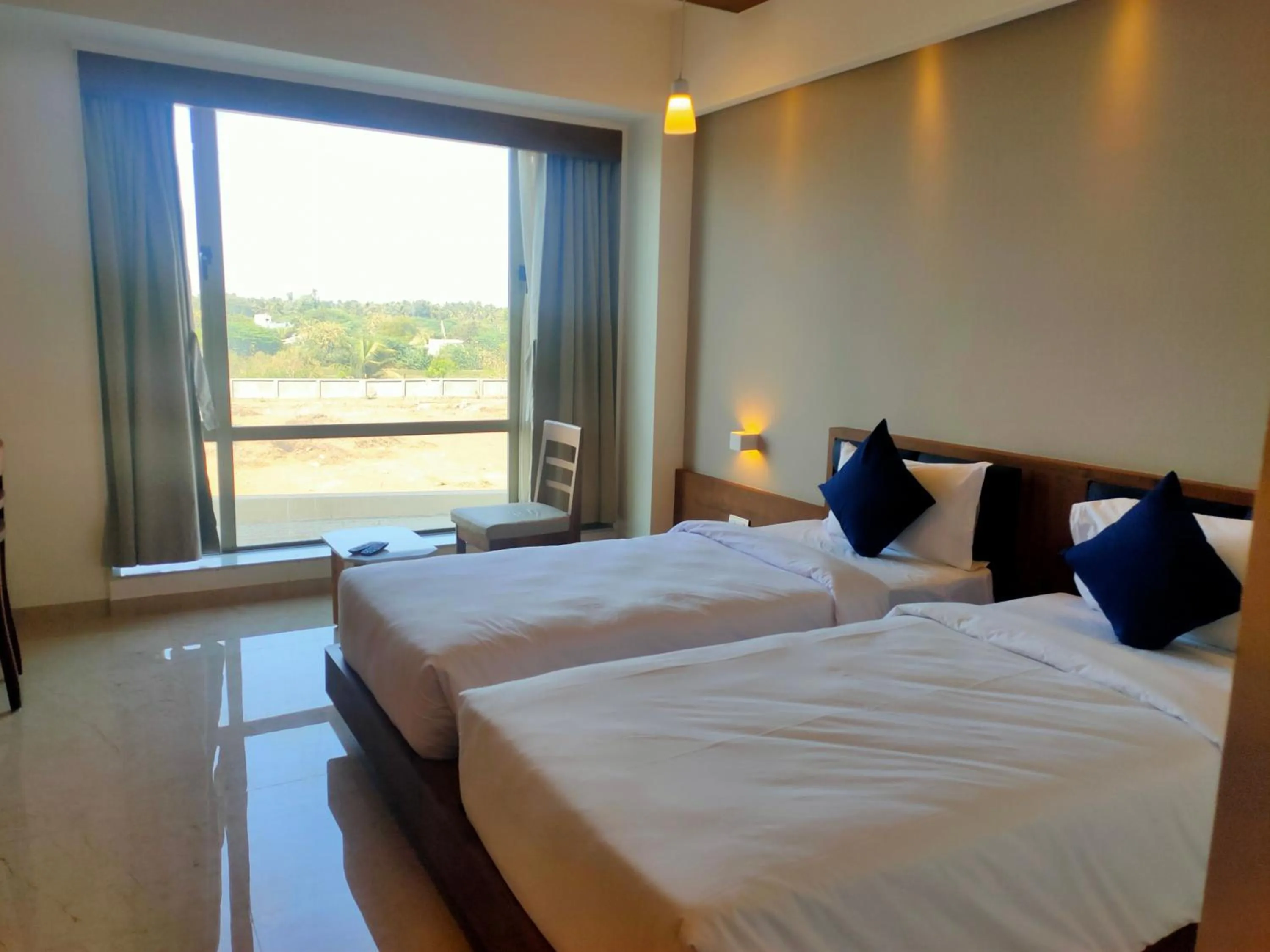 Bed in VITS The Somnath Gateway