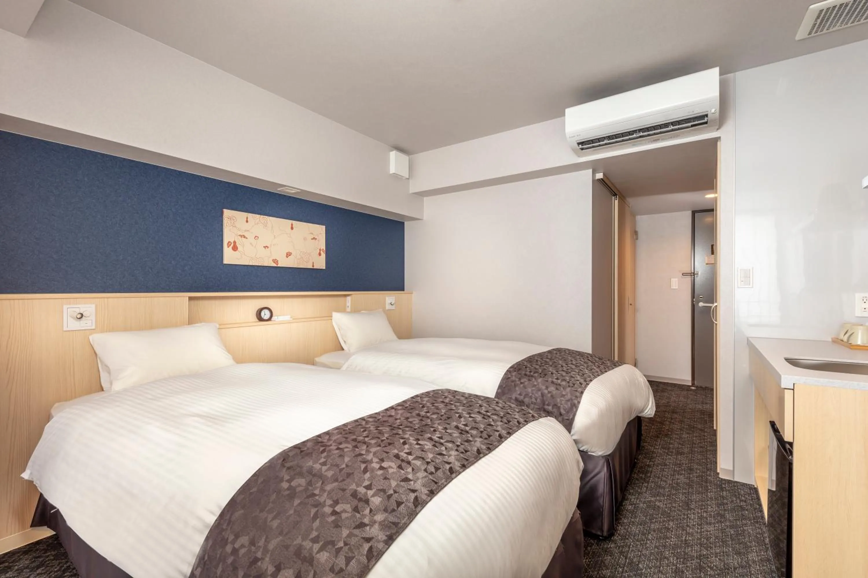 Bed in Hotel GOCO stay Kyoto Shijo Kawaramachi