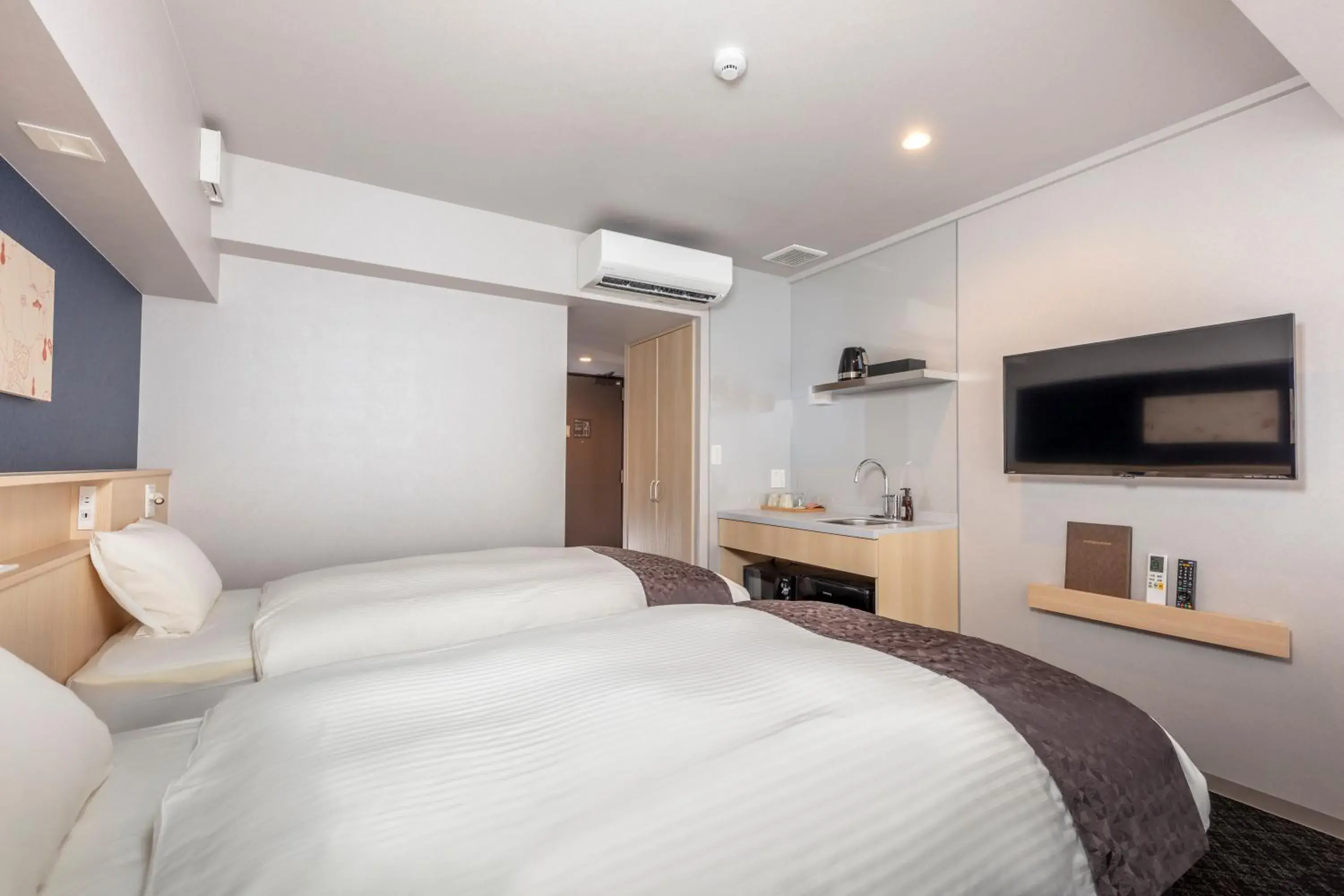 Bed in Hotel GOCO Stay Kyoto Shijo Kawaramachi