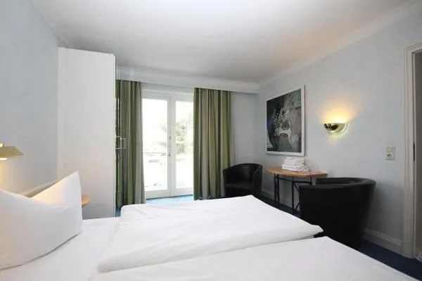 Photo of the whole room, Bed in Meeressterne Hotel Residenz in Heringsdorf