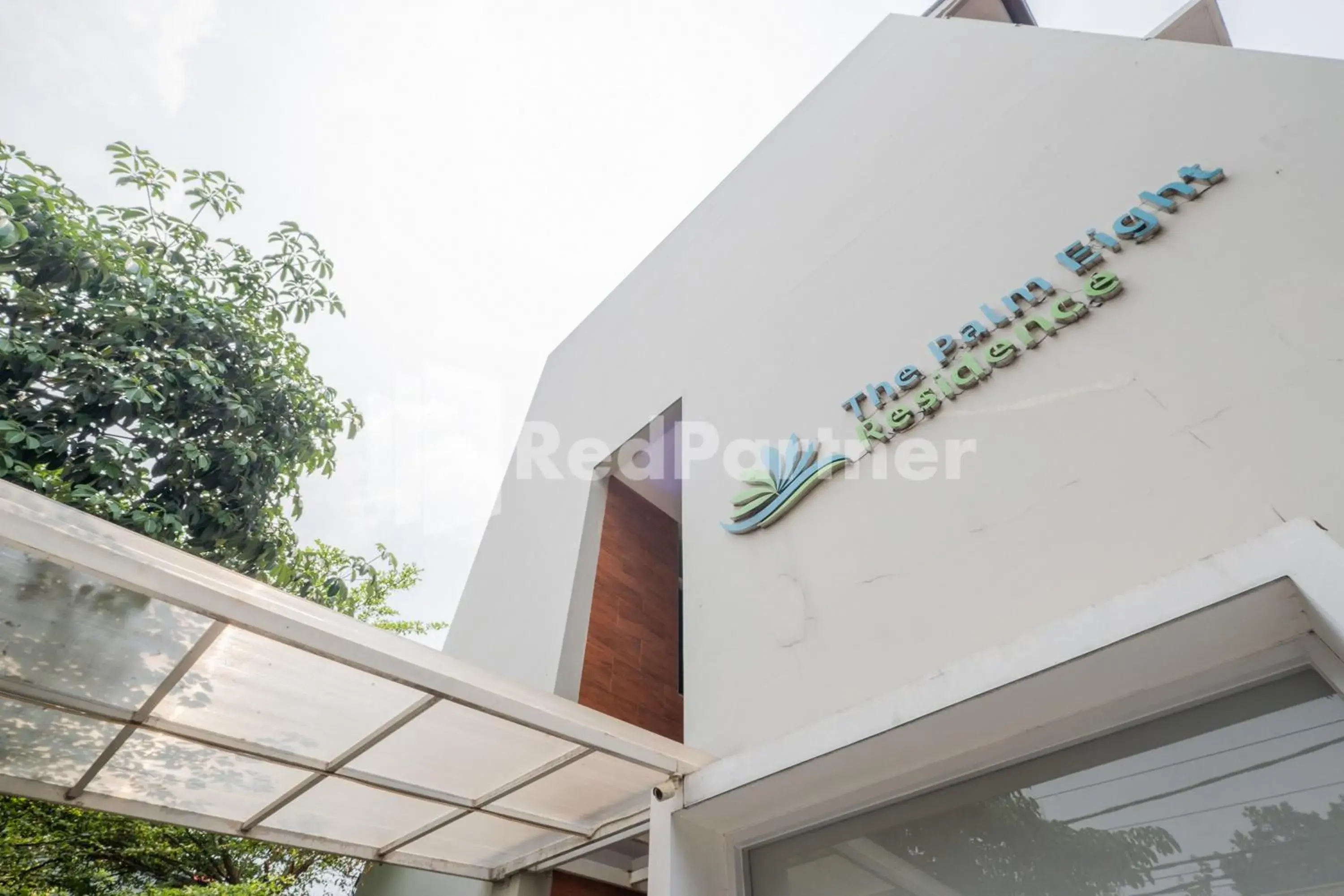 Property building in Palm Eight Mitra RedDoorz Property building in Palm Eight Mitra RedDoorz