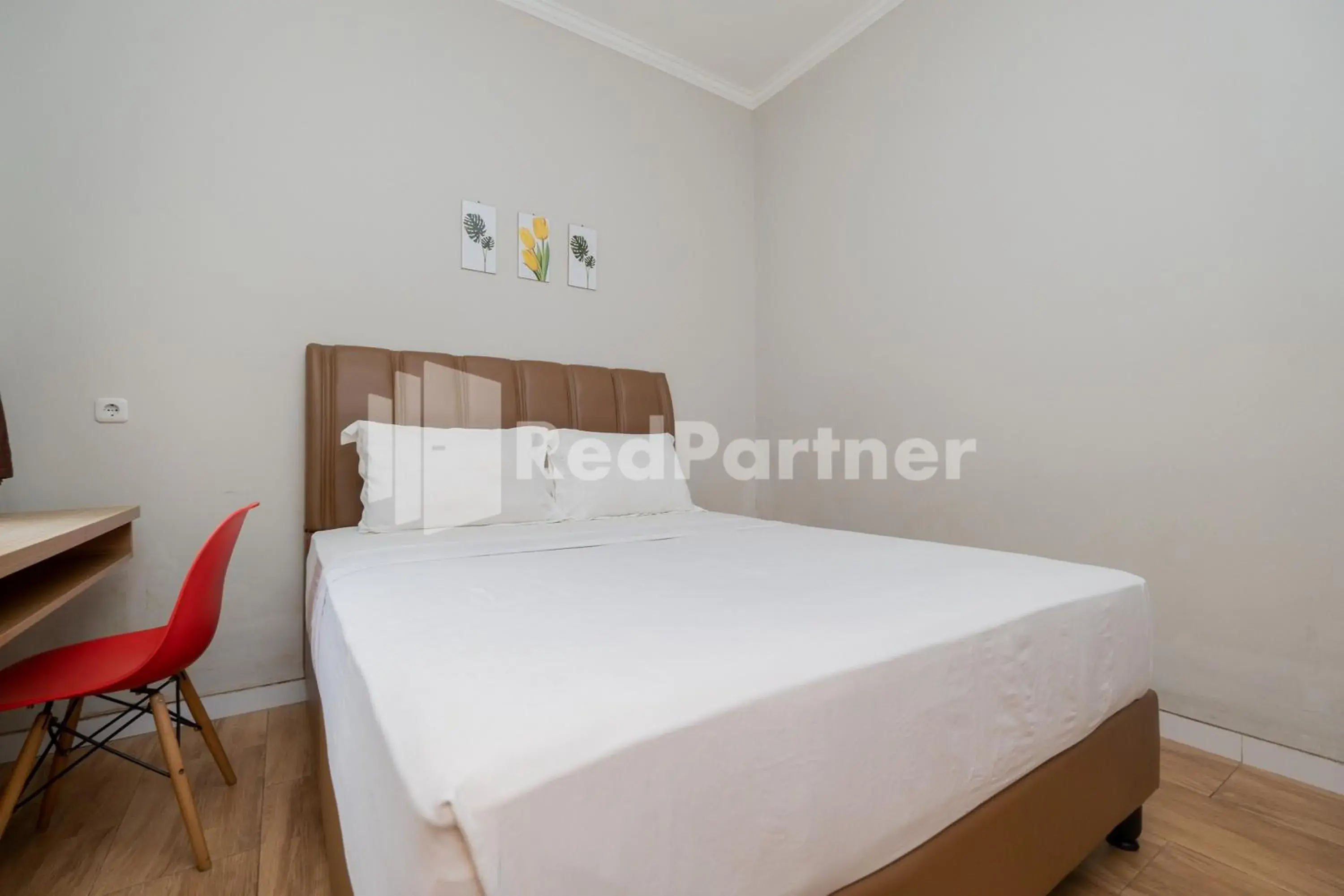 Bed in Palm Eight Mitra RedDoorz Bed in Palm Eight Mitra RedDoorz