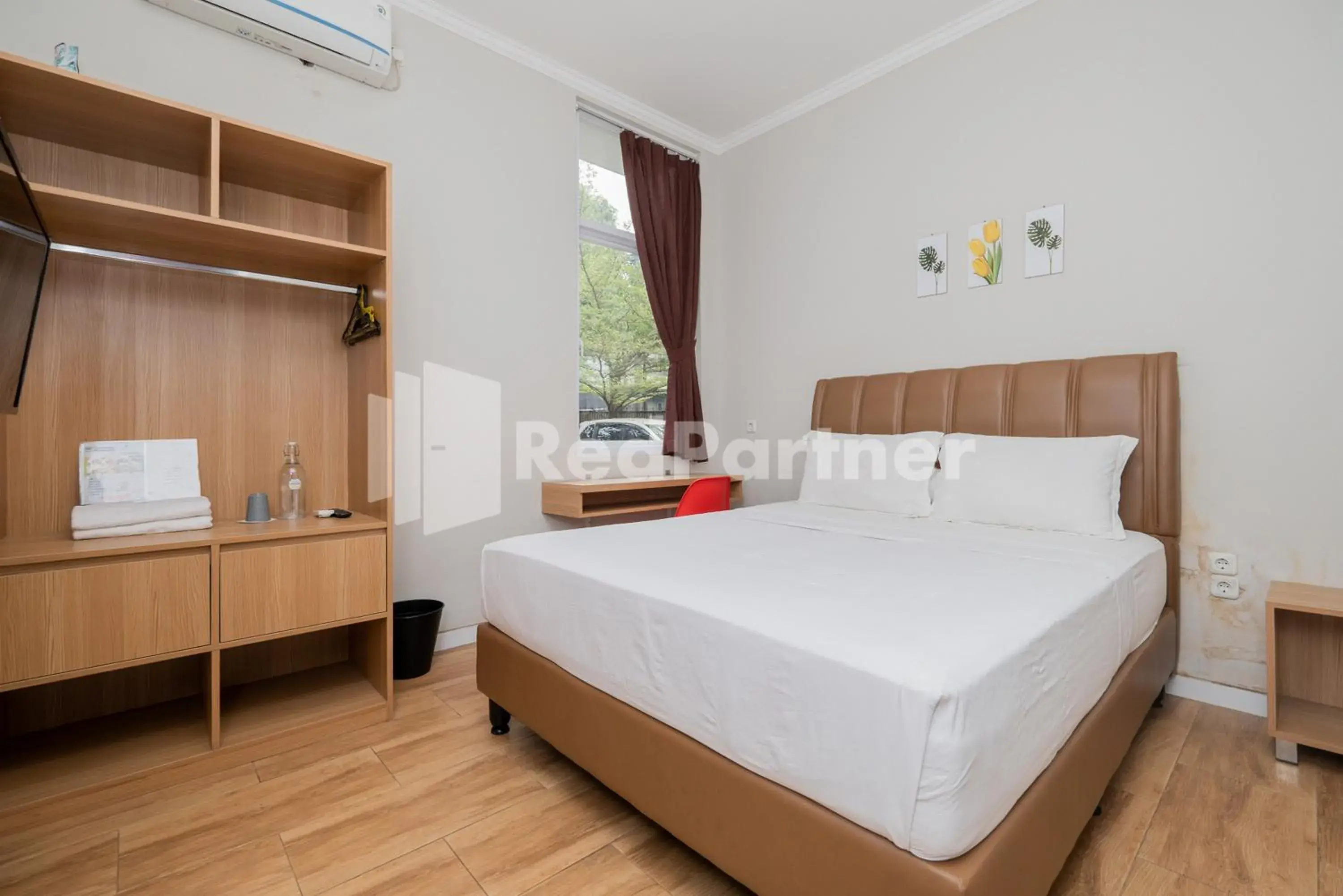 Bed in Palm Eight Mitra RedDoorz Bed in Palm Eight Mitra RedDoorz